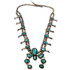 A Large Silver and Turquoise Squash Blossom
