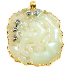 A White Serpentine Pendant with Inlaid Gold and Diamonds