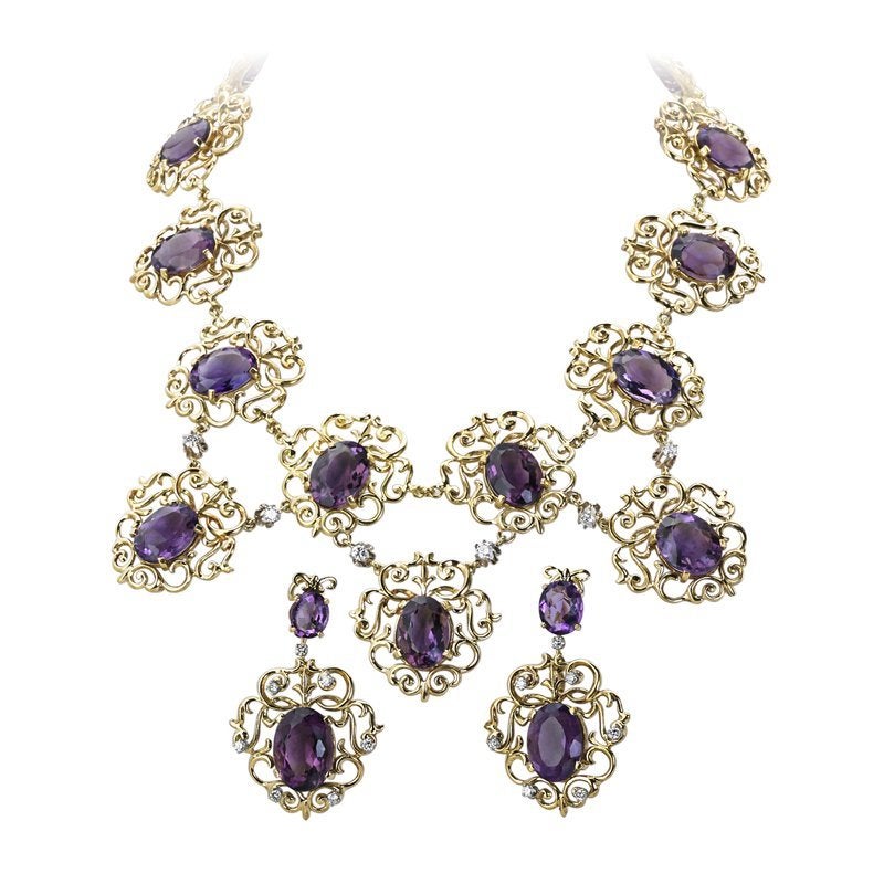 Massive fringe necklace of Arabesque links, set with oval faceted amethysts and diamond links, 17