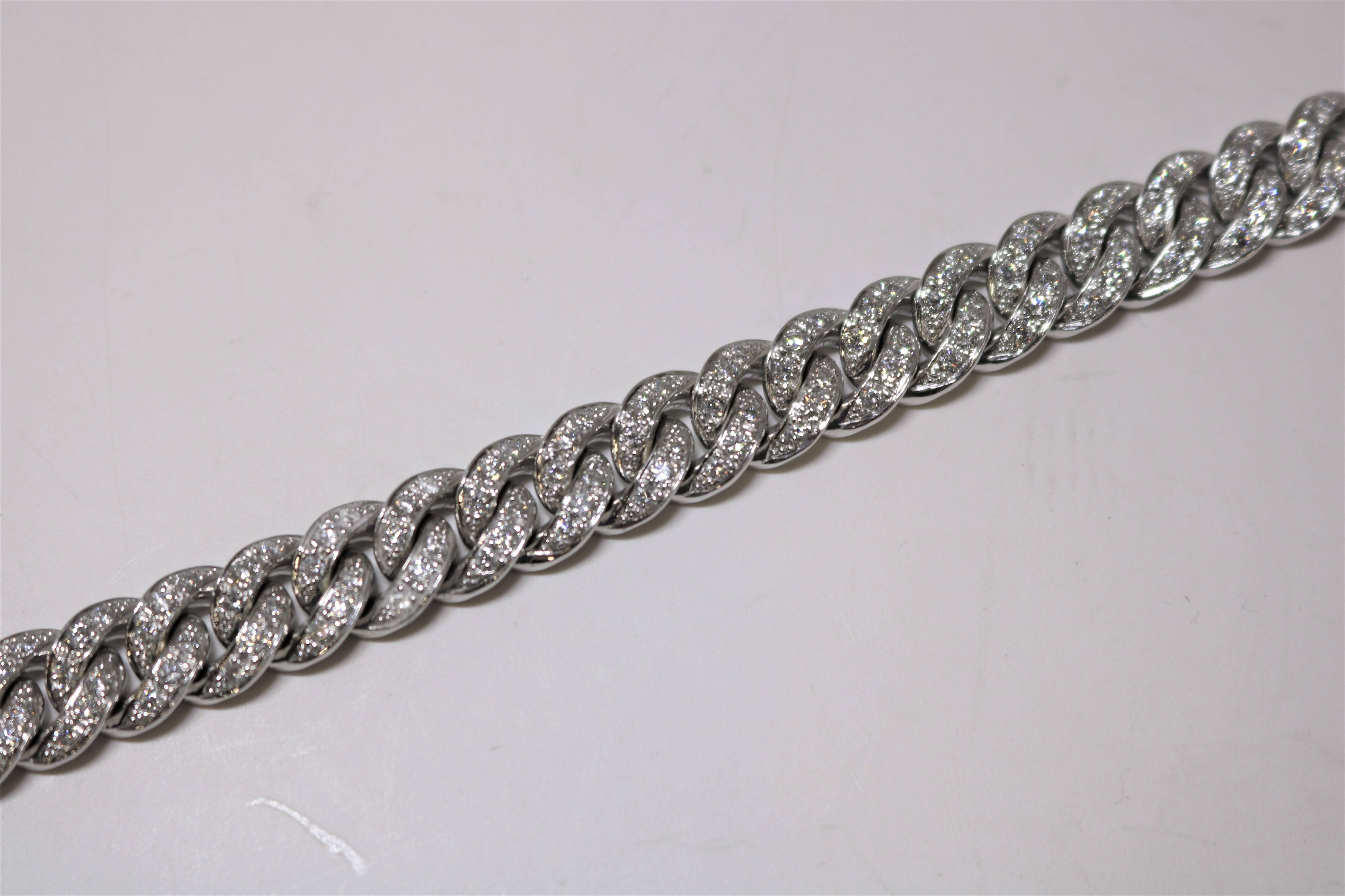 This bracelet is in 18k white gold containing diamonds weighing 4.45 cts. 