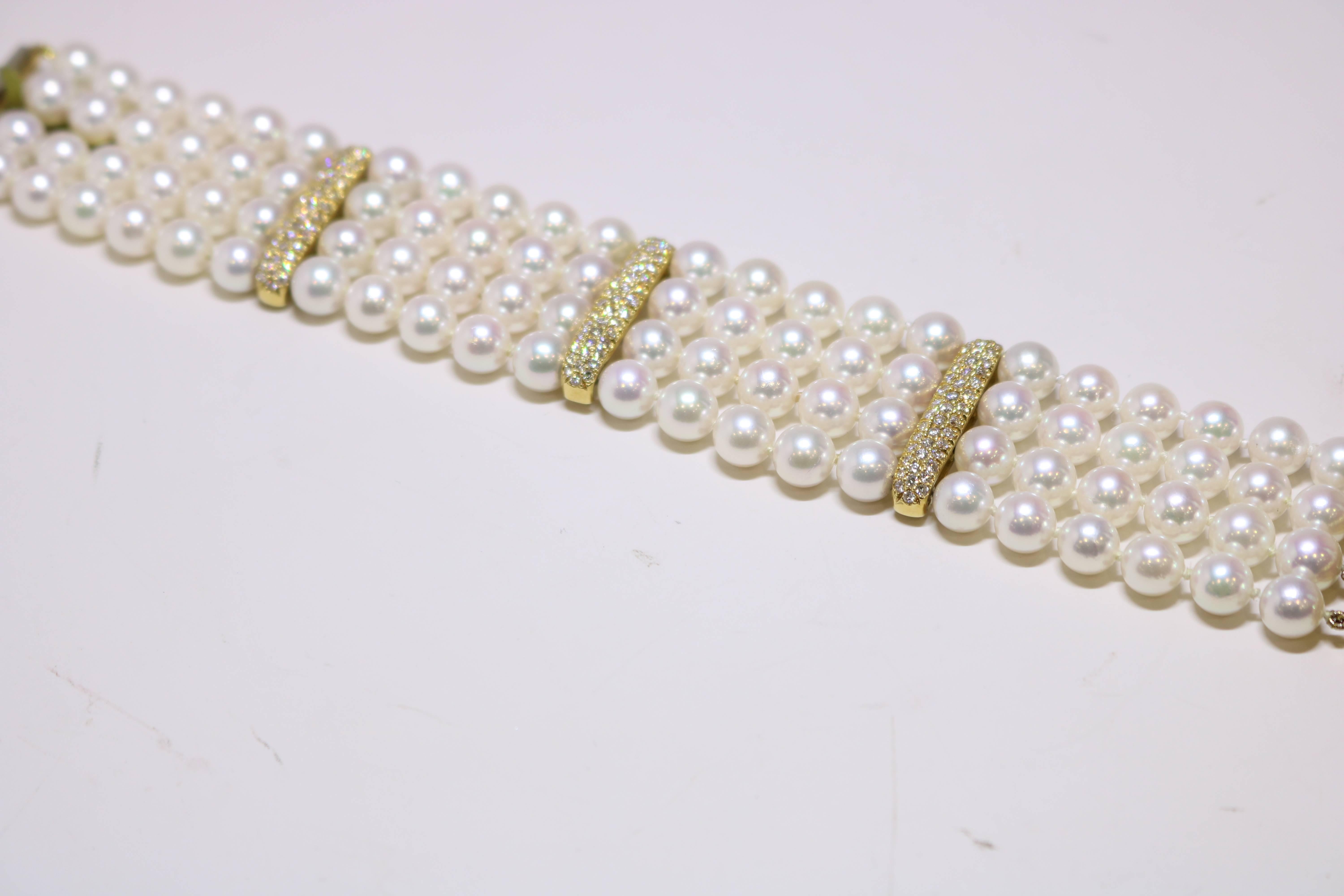 This exquisite bracelet is in 18k Yellow Gold features 3.35 Diamond, pave set, 4 rows akoya in 7-71/2 mm pearls, light rose color.