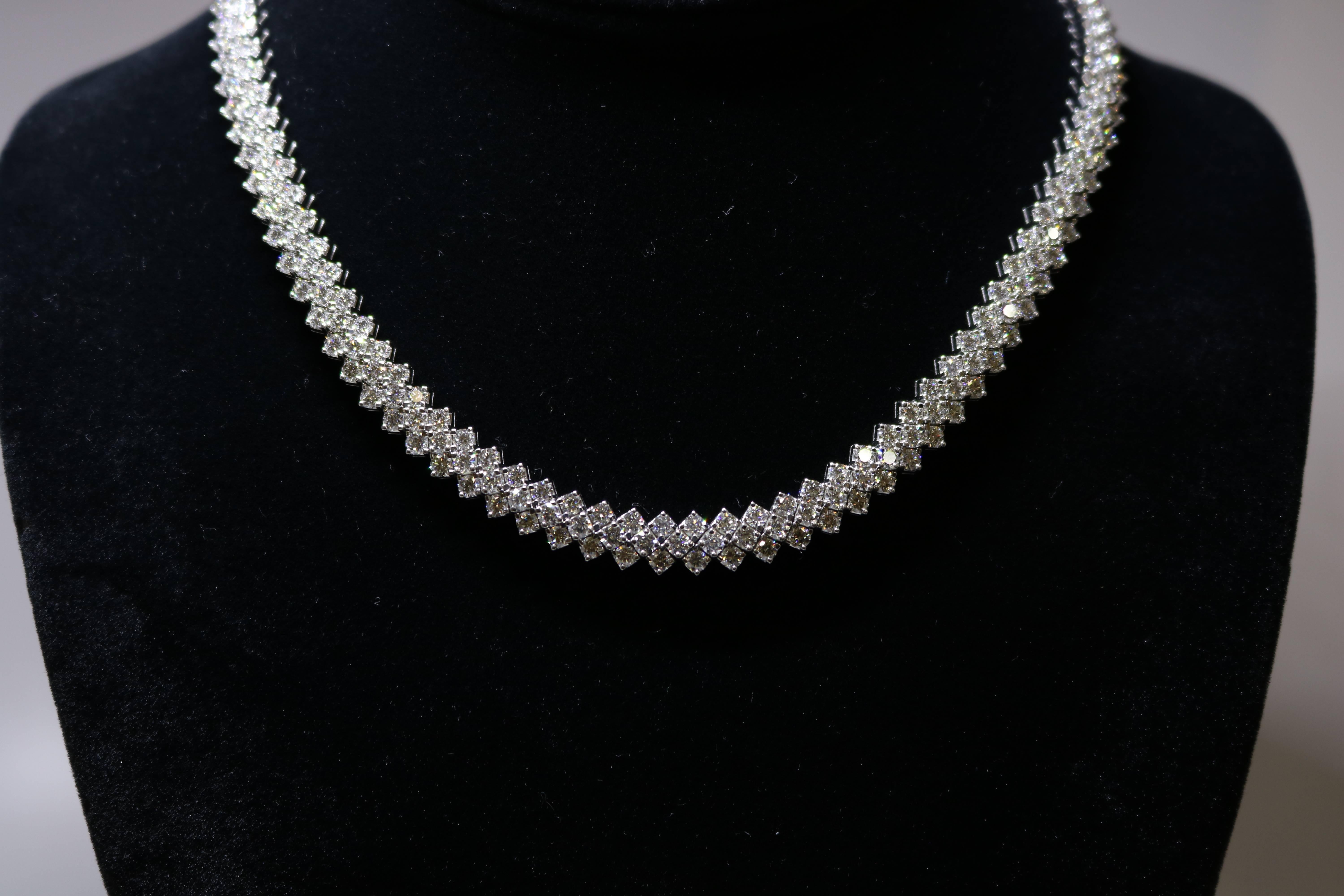 This 3 Row Diamond Necklace lays beautifully on the neck  is in 18k white gold necklace; 24.66 ct total diamond weight.