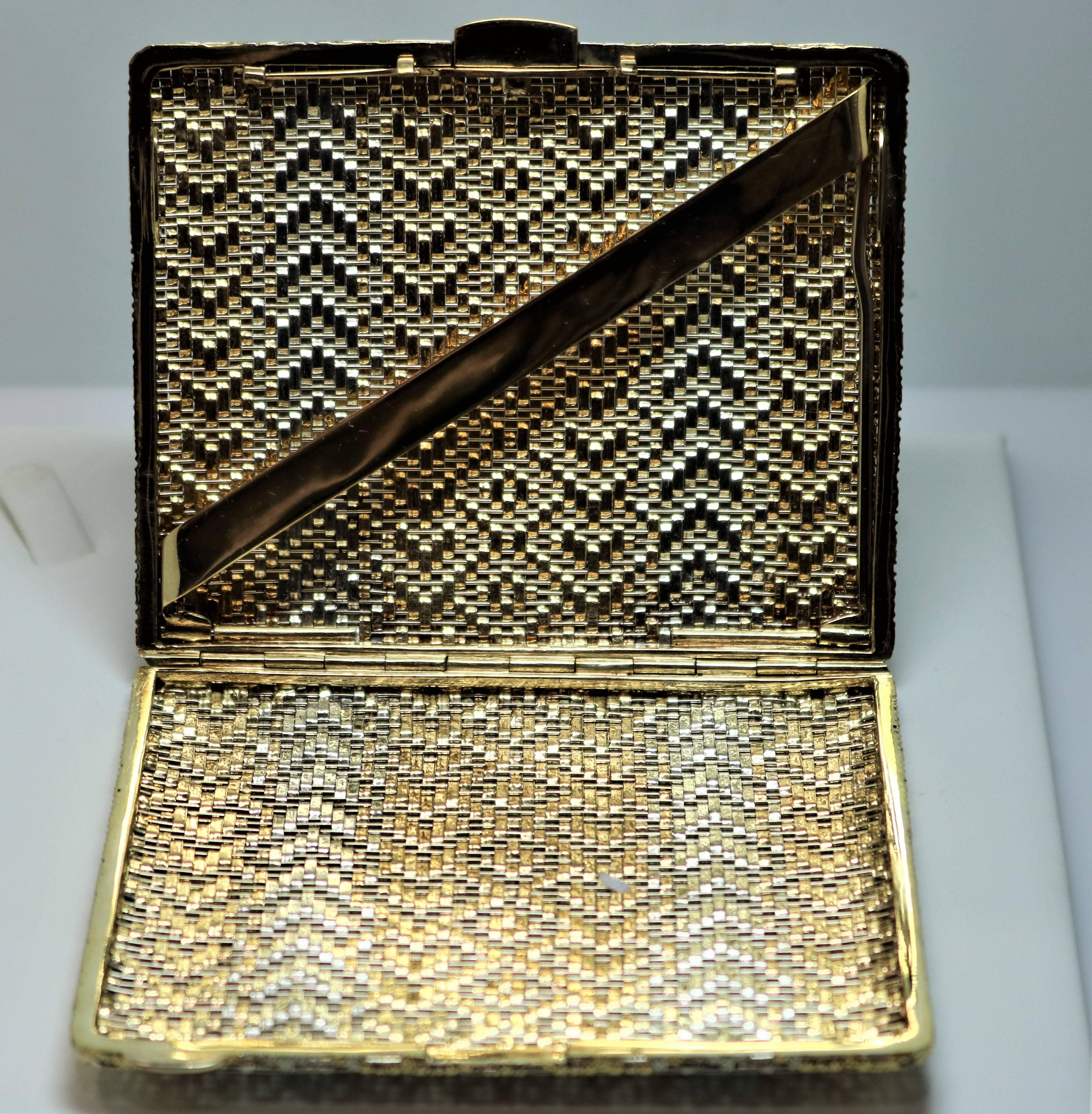 18kt white and yellow gold cigarette case. Pristine Condition, beautiful collectible piece.