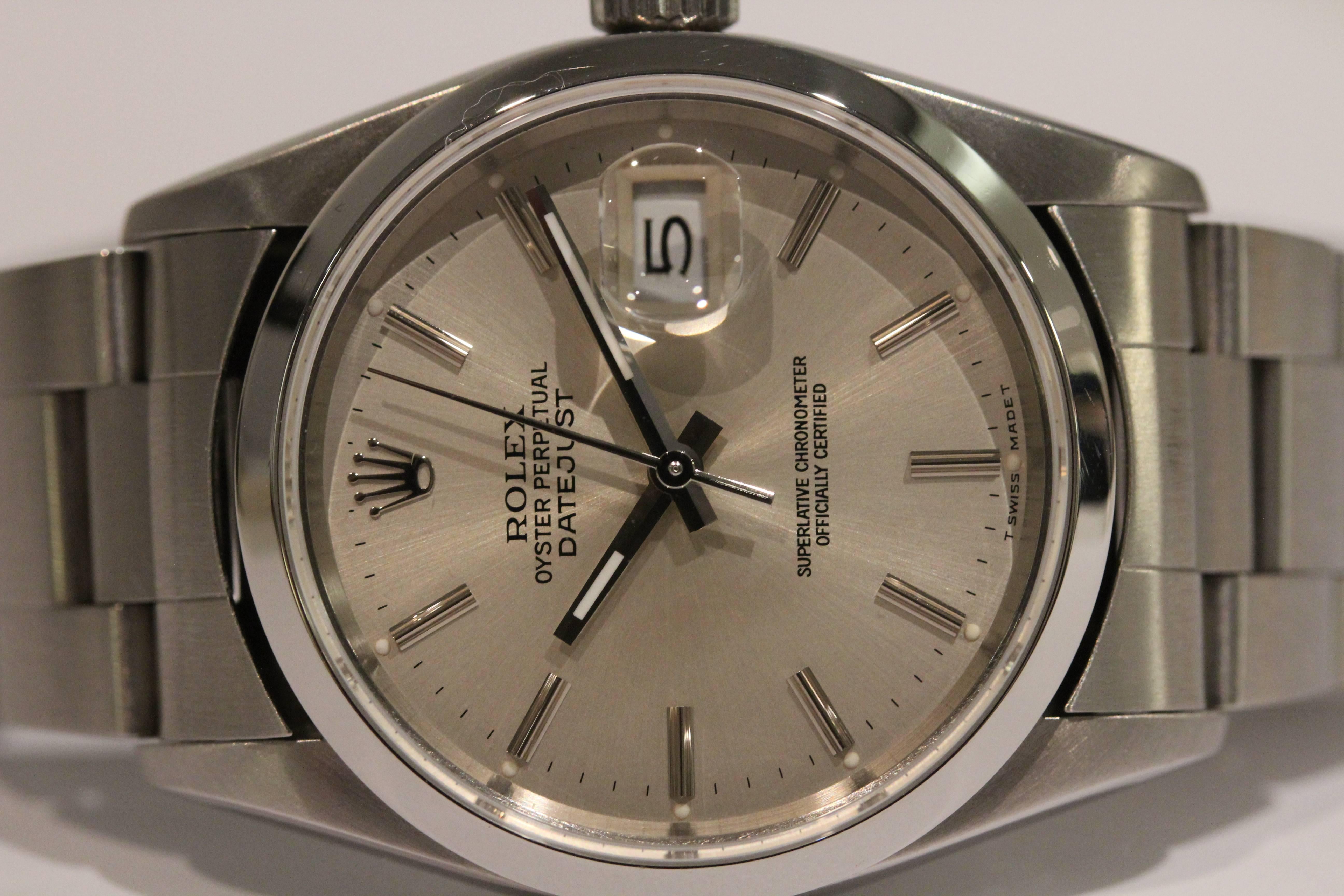 Stainless Steel Rolex Datejust with smooth bezel and Oyster bracelet.
The watch has a silvered stick dial with a date at the 3 position with a cyclops
lens.36 millimeter. Model # 16200 Serial #U687957 Circa 1997.No box or papers.