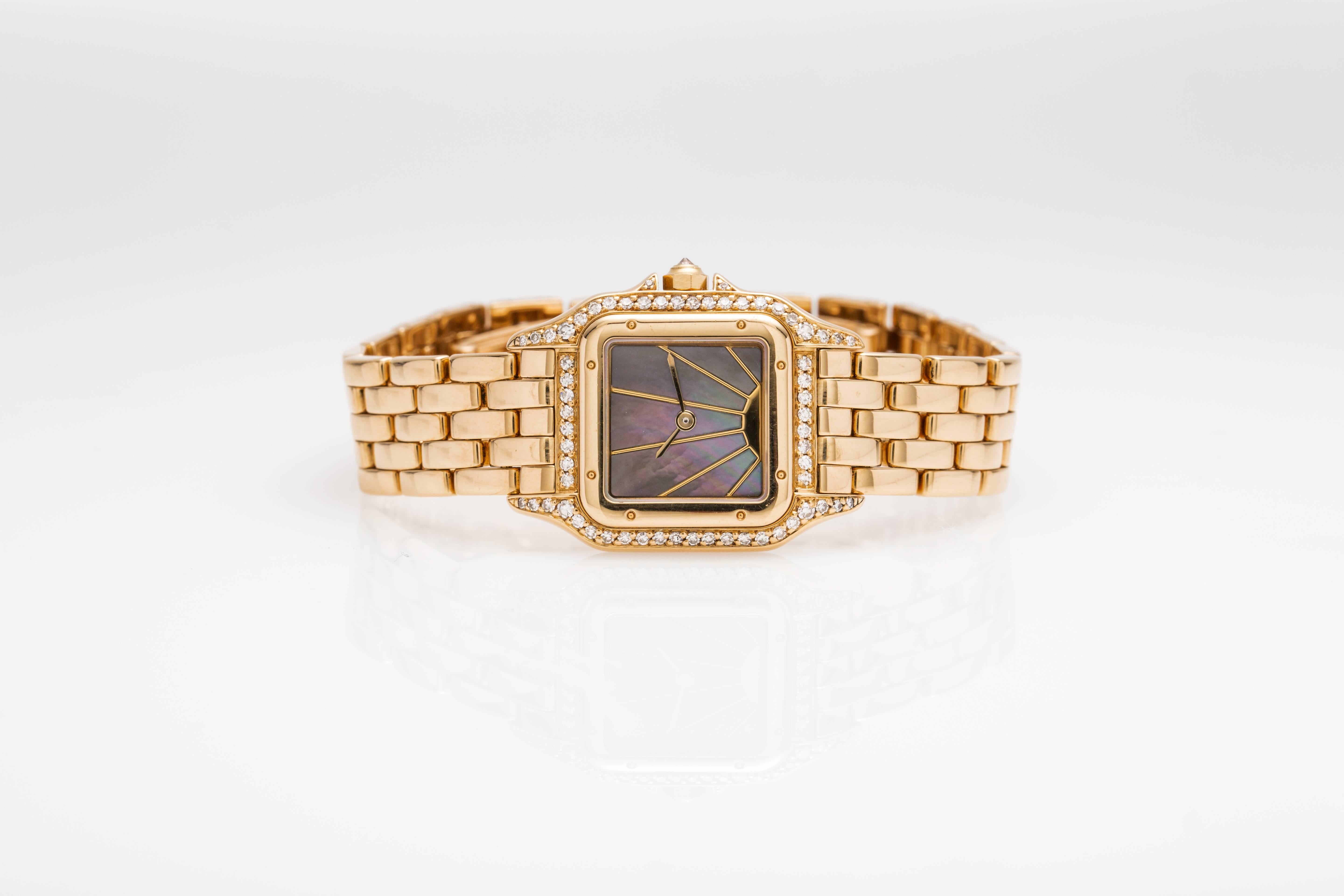 Rare Cartier Panthere watch, 18k yellow gold case and bracelet. Brown mother of pearl dial with starburst design. Diamond bezel and lugs. Model #8057915 
Beautiful Condition. Expertly Restored by watchmakers sold with a 1 year warranty. Quartz