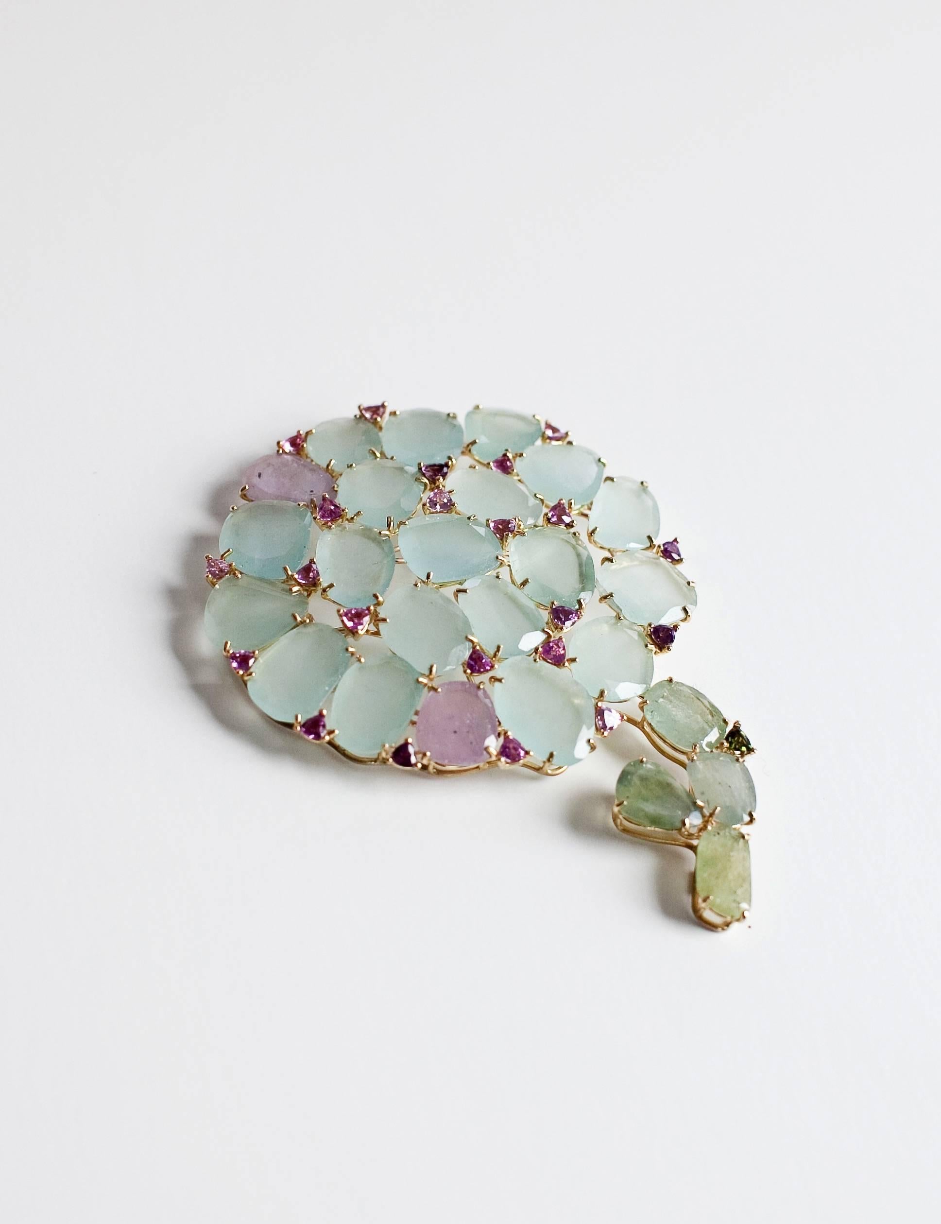 Soft and feminine like the flower itself, the Hydrangea Pendant/Pin, comprised of Aquamarine (113.25 Carat) with Pink (4.88 Carat) and Green (17 Carat) Sapphires, is an ode to Nantucket’s favorite flower. Can be worn as a pin or a pendant to hang on