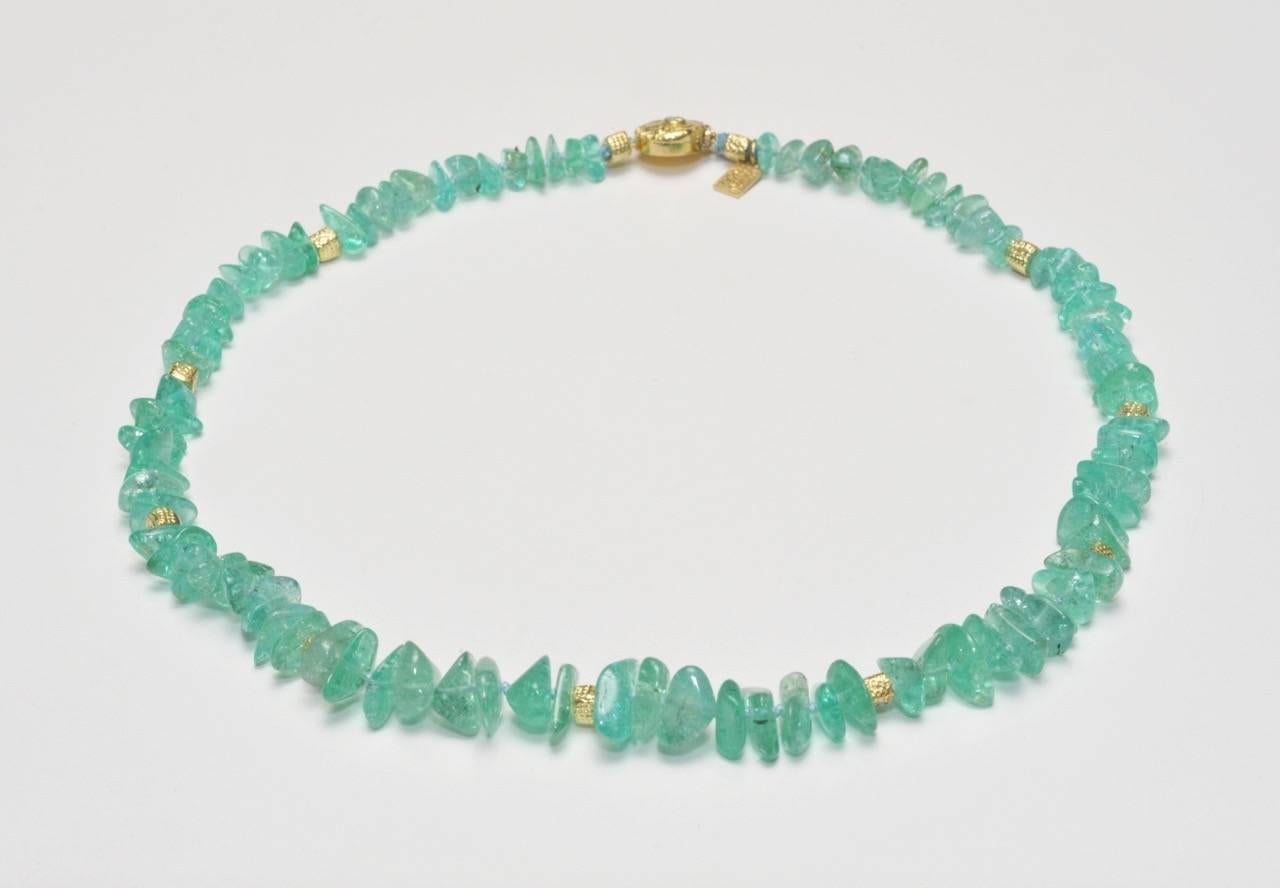 As Paraiba Tourmalines become rarer, with the Brazilian mine now depleted, Susan works to capture the captivating beauty of the stone.  The color's brilliance comes through in the sliced shapes of the beads, further accentuated by 18kt Gold and