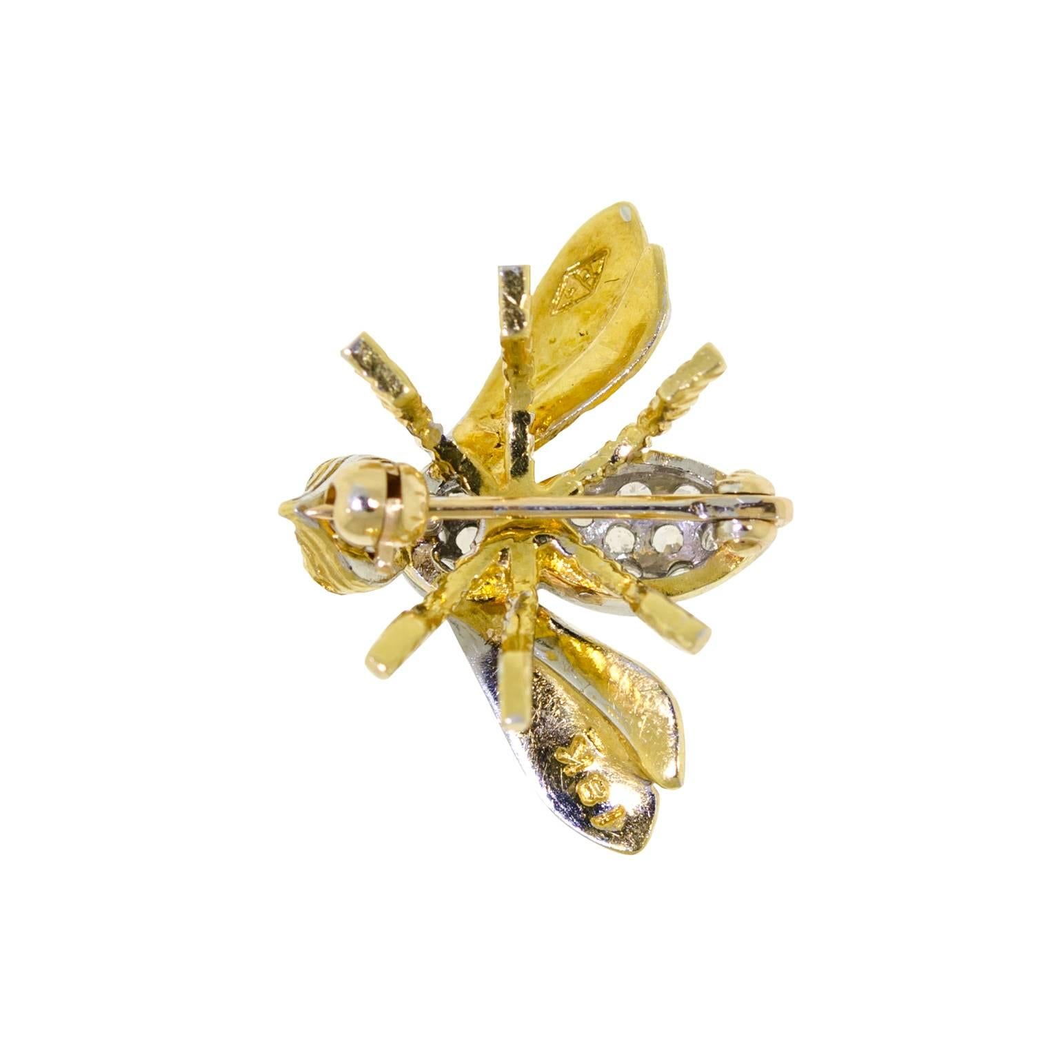 This adorable diamond and ruby 18-karat yellow gold petite bee brooch designed by Herbert Rosenthal is an enjoyable little treasure. Set with approximately 0.35cts full-cut dazzling diamonds that sparkle and shine against the polished gold with