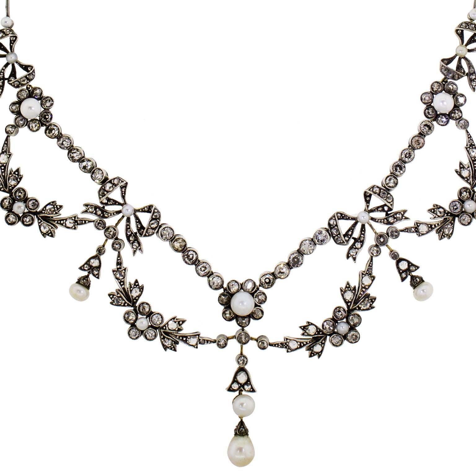Outstanding Victorian Diamond and Pearl Garland Necklace  set with 56 bezel set old mine cut diamonds weighing approx 7.29 cts further set with 116 rose cut diamonds with an approx. weight of 1.66 cts for a total of 8.95 cts. set into a hand made