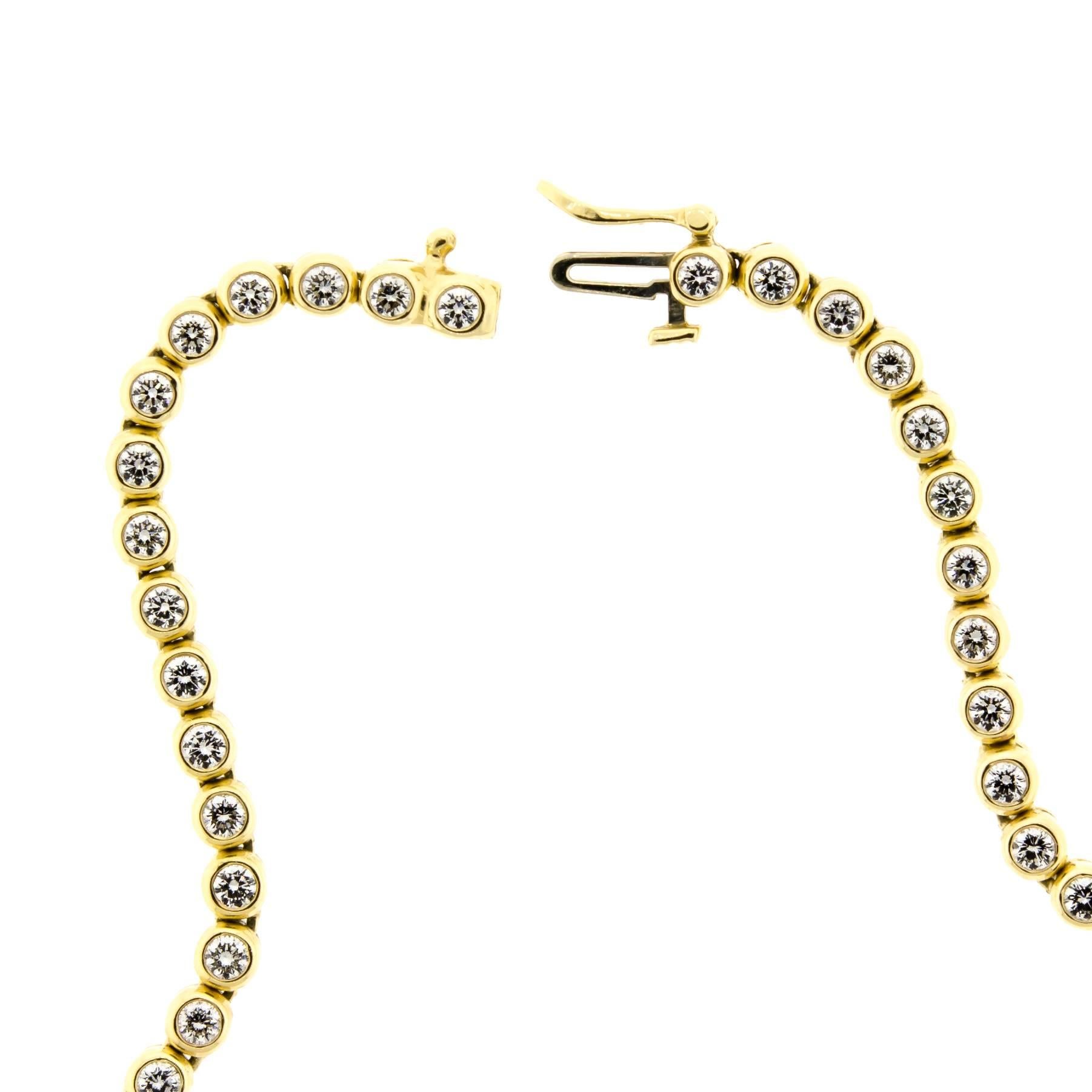 Round Cut Brilliant and Dazzling Diamond and 14 Karat Yellow Gold Tennis Style Necklace For Sale