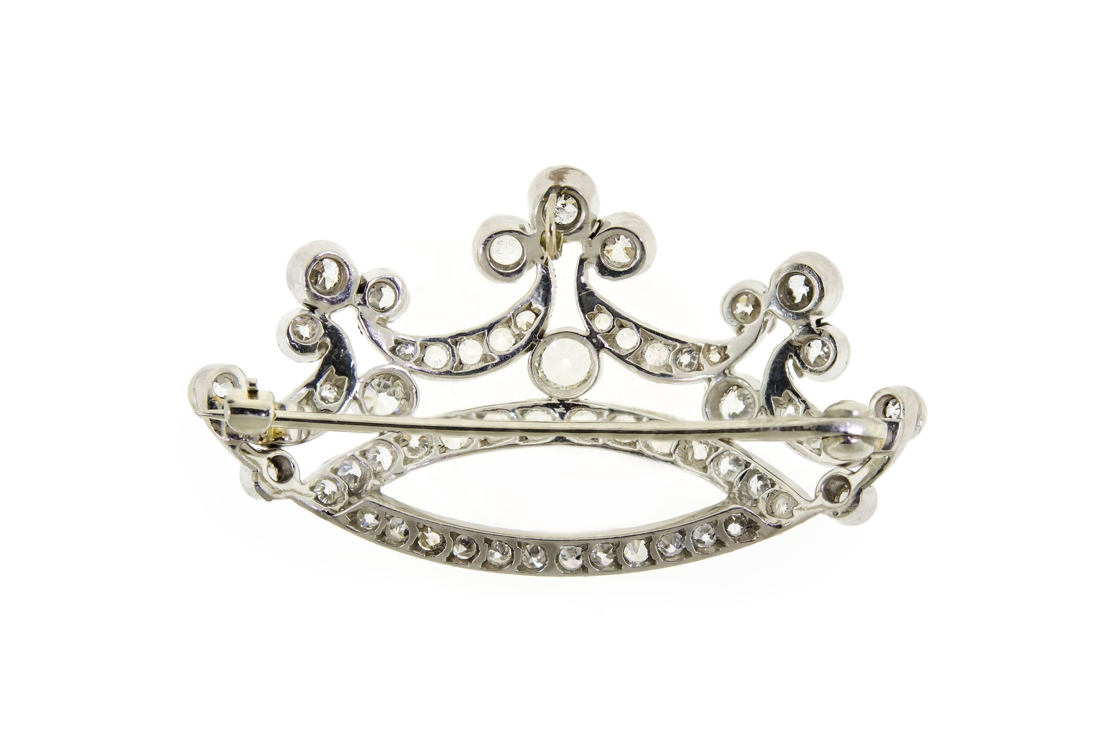 Lovely antique Edwardian Circa 1900 diamond and platinum crown brooch/pendant set with approximately 1.60 ct. plus of Old European Cut diamonds into a platinum mount - lively VS quality diamonds, GHI color, set into a platinum mount which can be