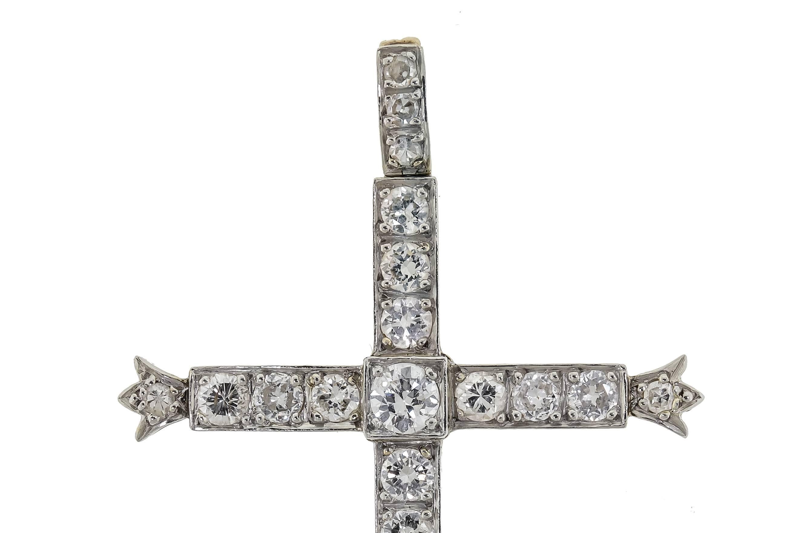 Antique platinum topped 14 kt yellow gold diamond cross set with 23 diamonds approx. 1.18 total weight G-H, VS1-SI1