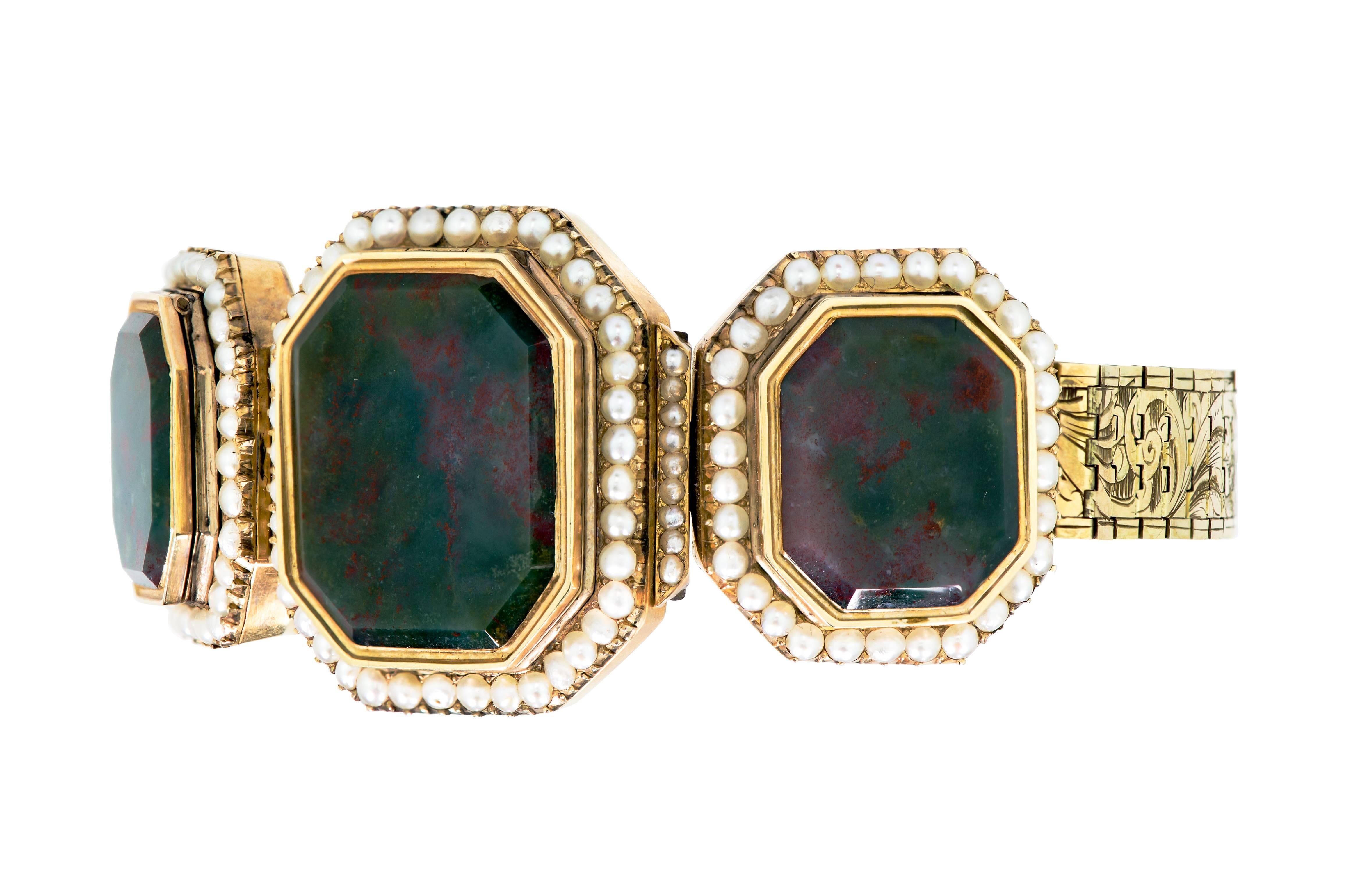 Beautiful Victorian Bloodstone Seed Pearl and Yellow Gold Flexible Bracelet consisting of three rectangular bloodstone tablets with seed pearl surround set in an elaborate engraved foliate design flexible link bracelet - with engraved clasp all