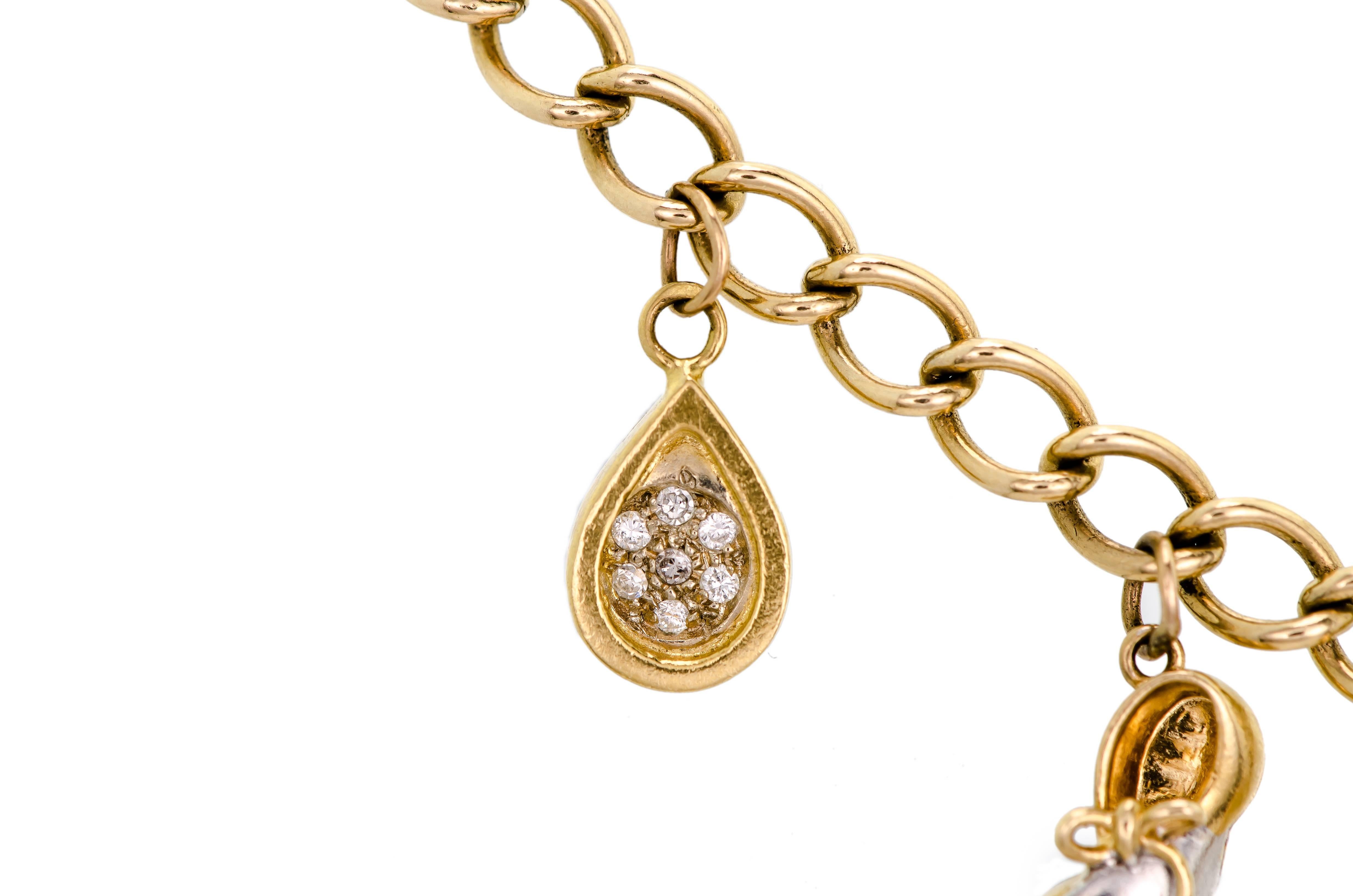 Adorable 14 Karat Yellow Gold and Diamond Charm Bracelet In Excellent Condition In Lombard, IL