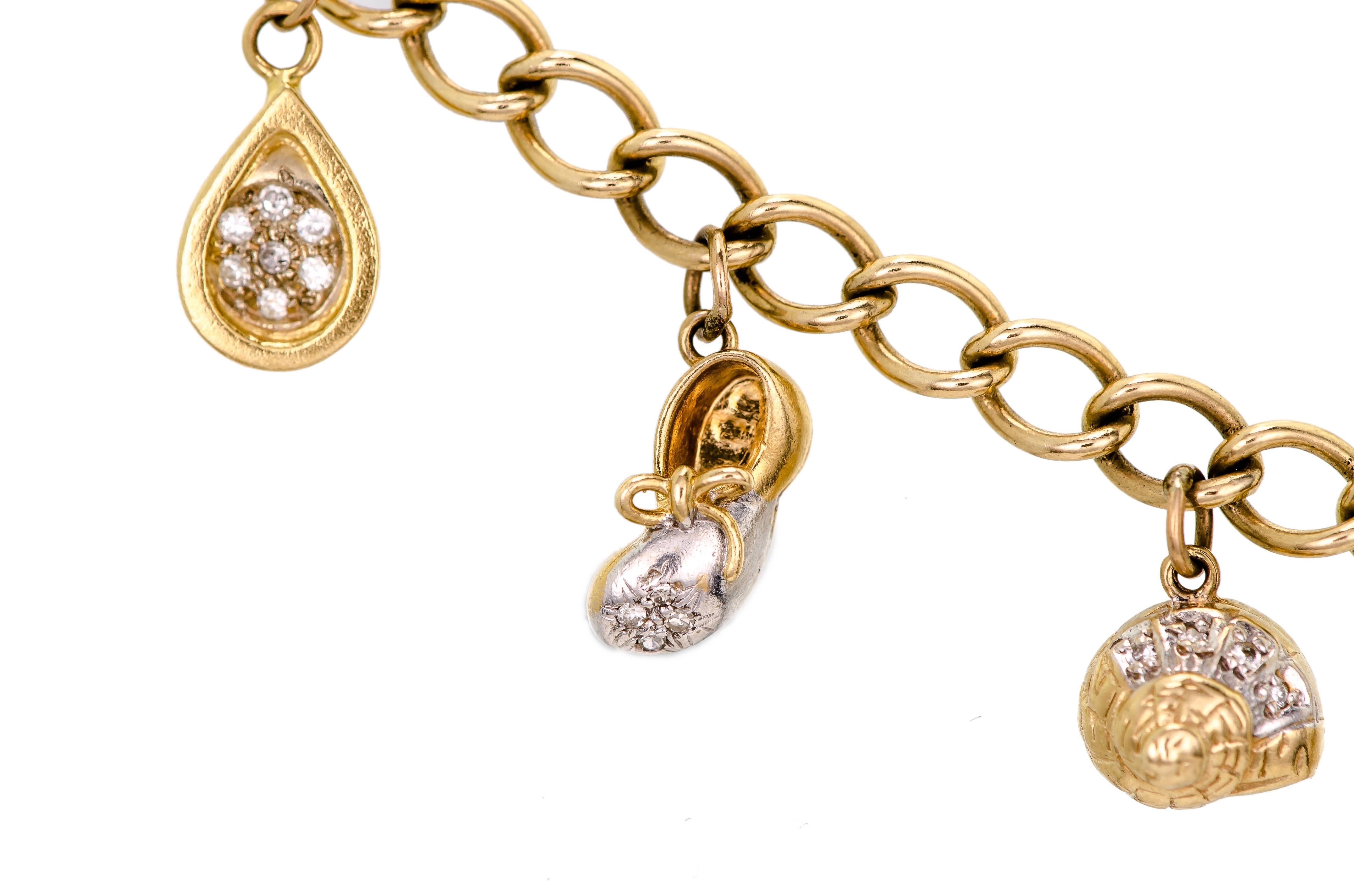 Women's Adorable 14 Karat Yellow Gold and Diamond Charm Bracelet