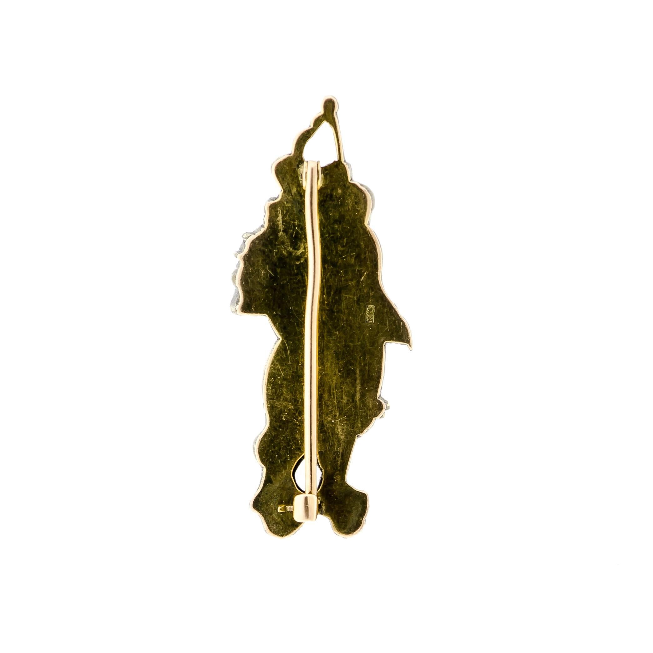 Charming antique Japanese shakudo figural brooch, two figures rendered in Japanese shakudo (mixed alloy of gold copper) on a 14k yellow gold mount - length approx 1 5/8