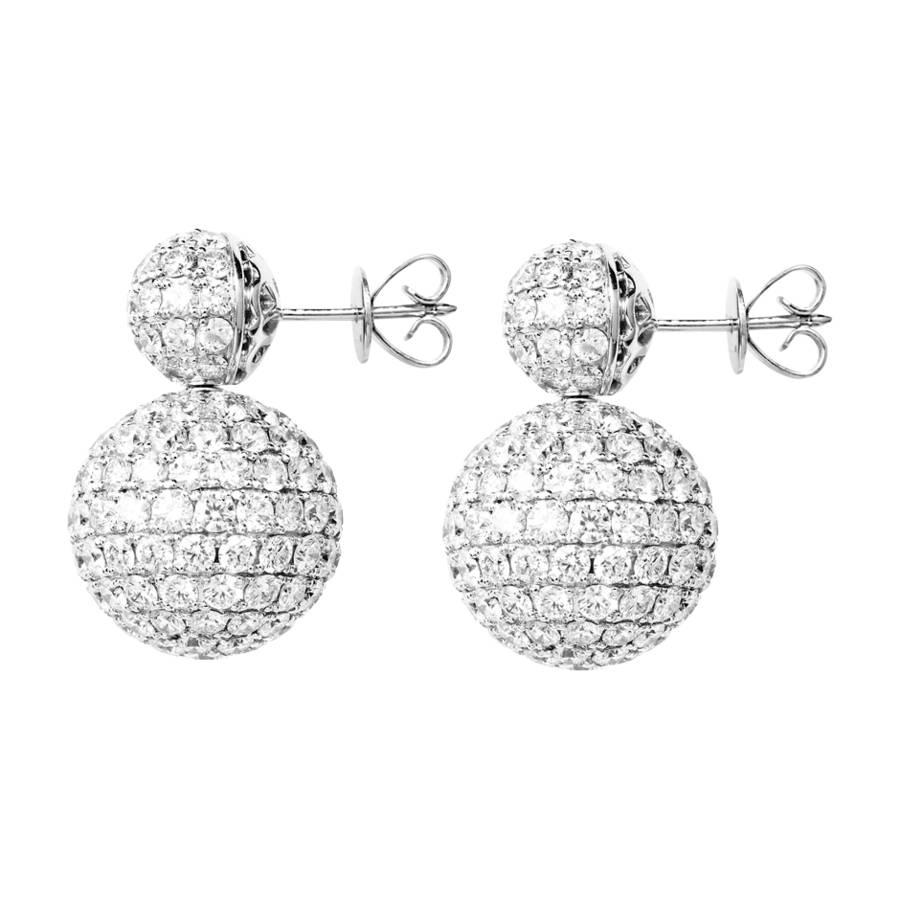 These lustrous earrings feature pave diamonds with a total weight of approximately 12 ct. The earrings are crafted in 18 karat white gold and are available in yellow gold, rose gold and platinum upon request. 
