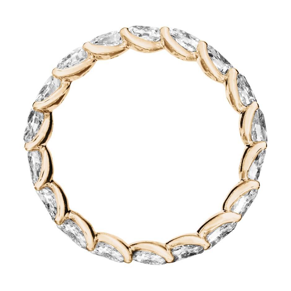 This eternity ring features prong-set navette-cut diamonds (G VS) with a total weight of 2.74 ct. The ring is crafted in 18 karat rose gold and is available in yellow gold, white gold and platinum upon request. 