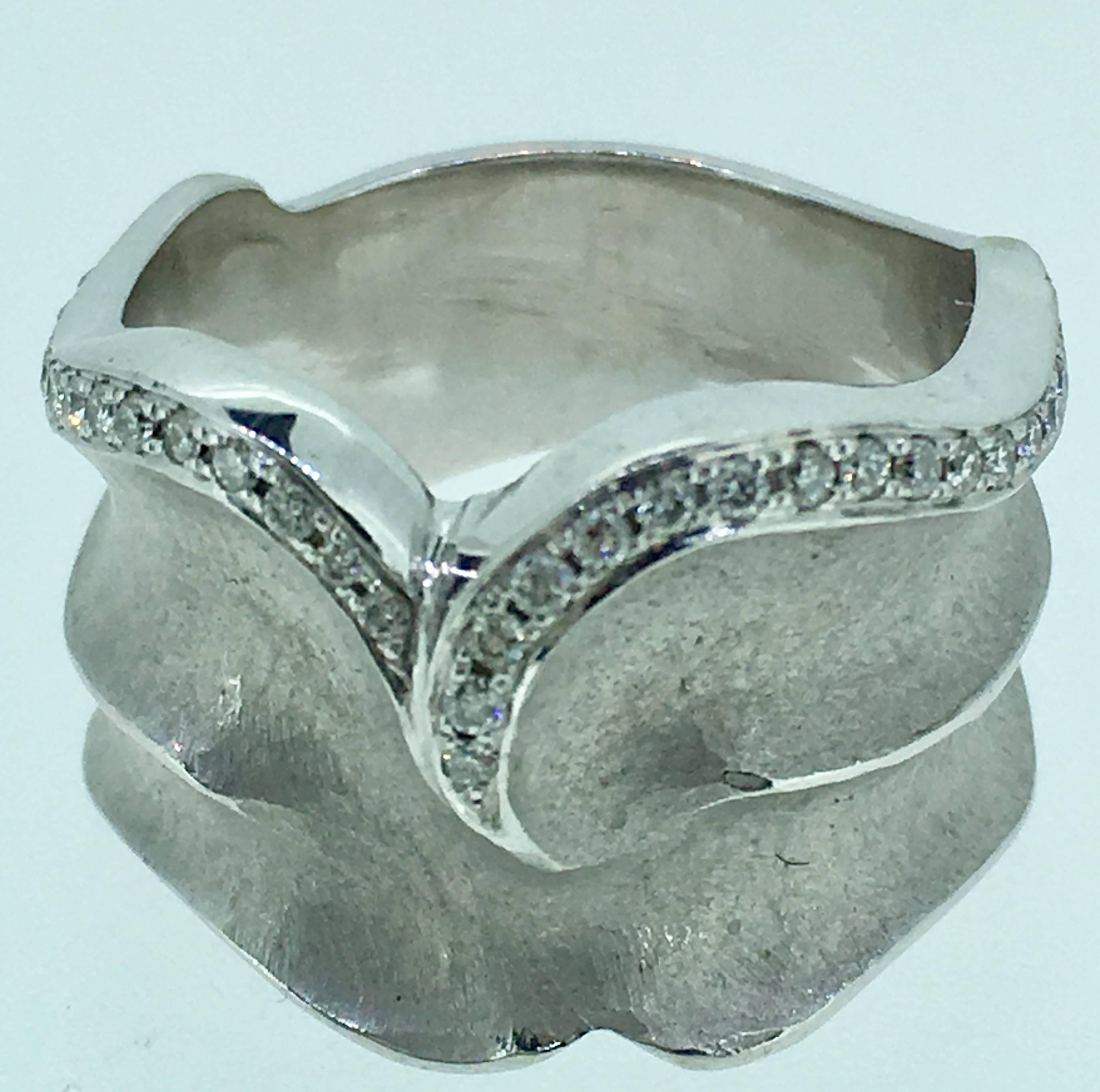 One of a kind SVG signed unique wedding ring. This piece is made of 10.4 gr white palladium gold and 0.3  cts diamonds