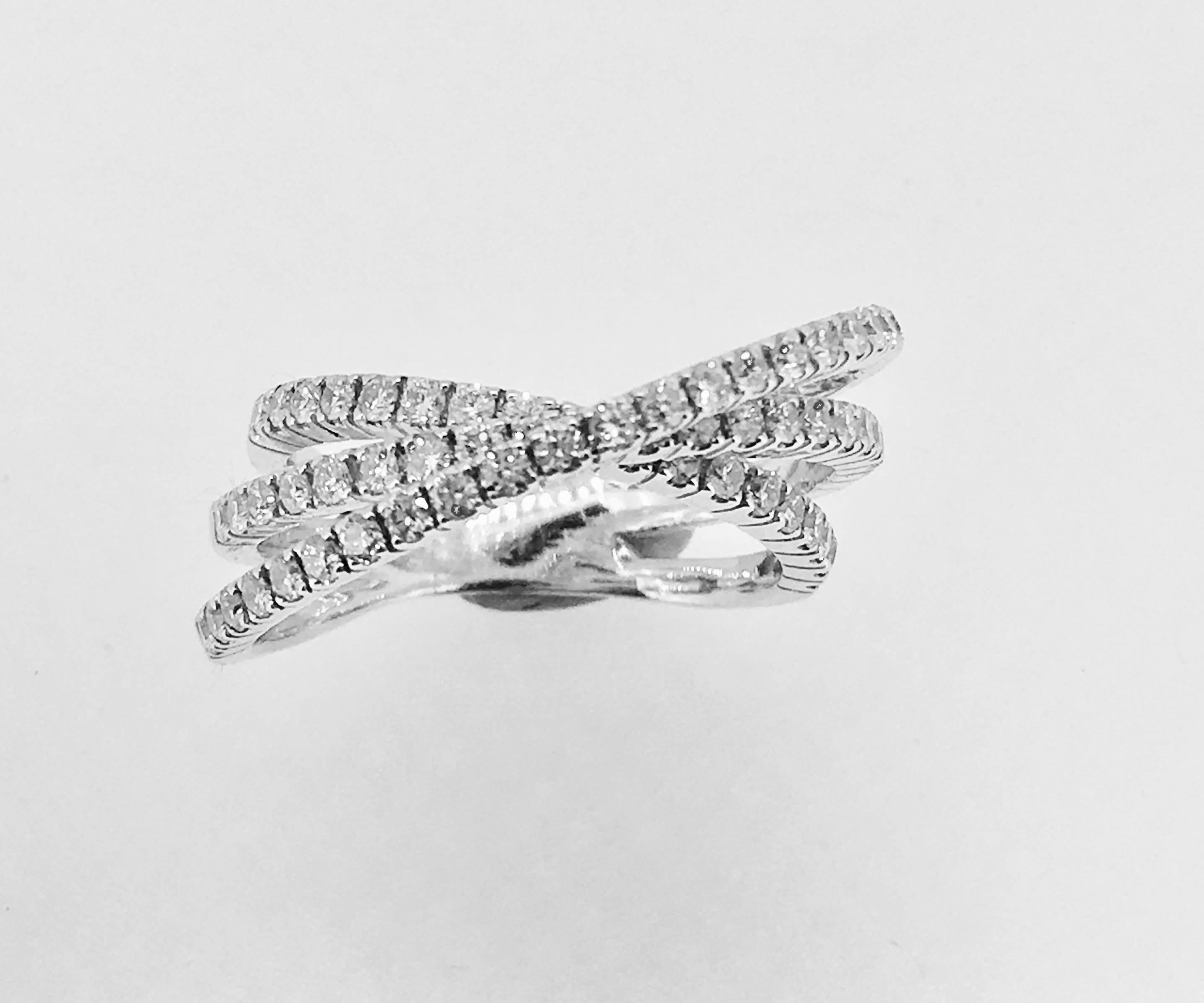 Beautifull white Gold diamond ring made by Steven in our Antwerp workshop .
The piece is a subtil combination 69 diamonds for a total of 1.38 ct .
It fits a 54.5 finger but we can size your finger too .