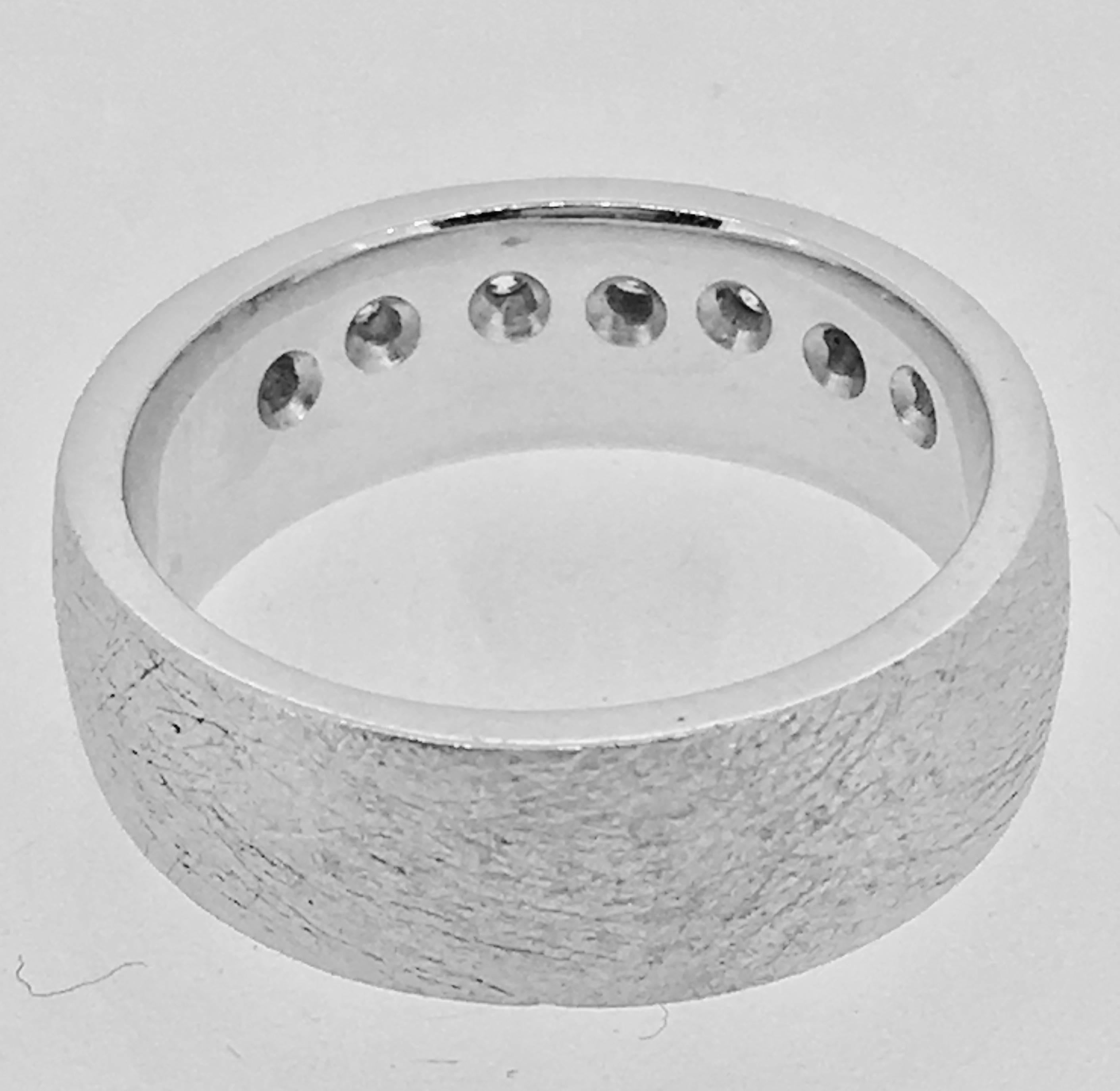 Modern Wedding Ring Signed SVG with 7 diamonds for a total of 0.21 ct.