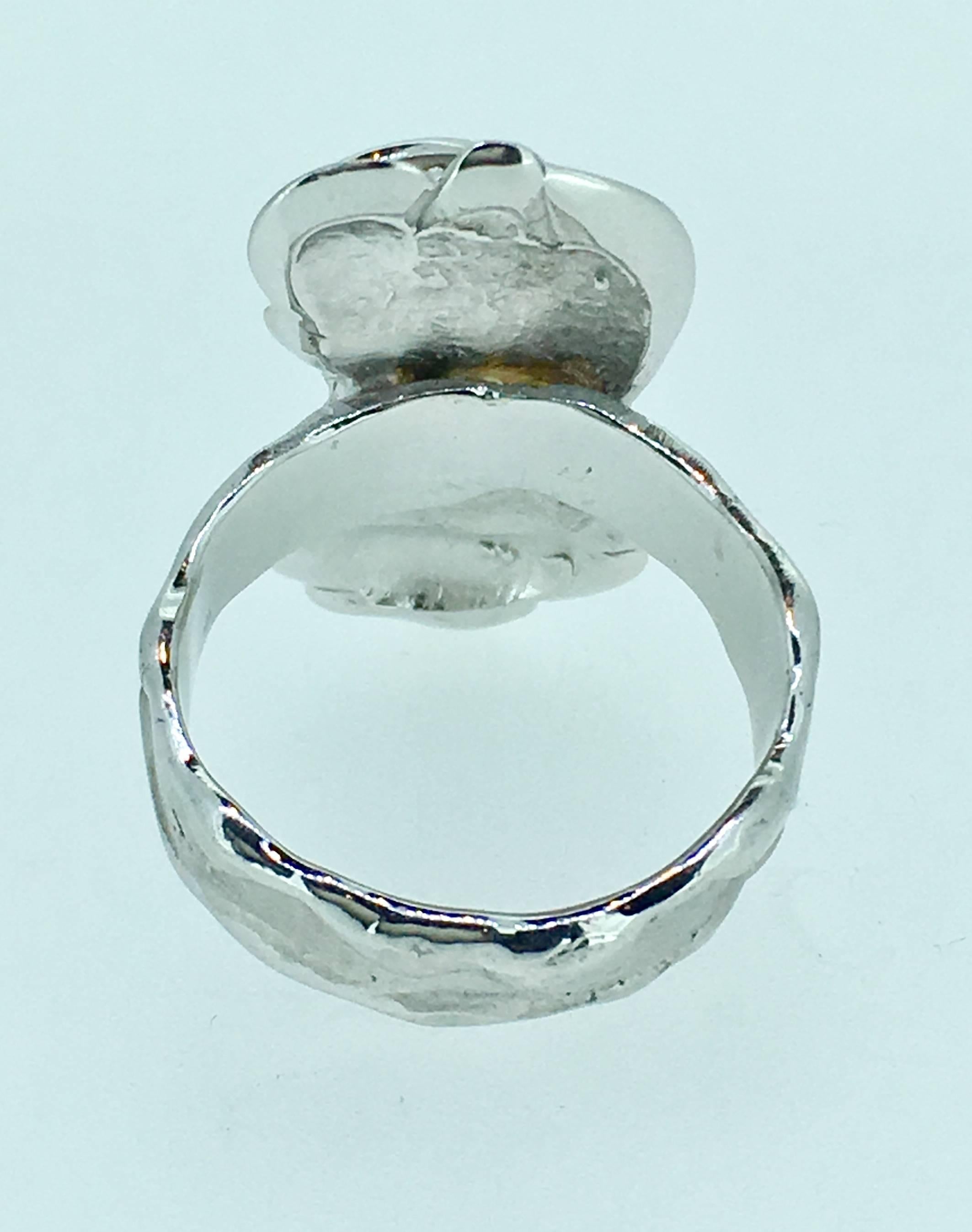 White Gold Ring signed SVG . One of a kind piece that you wear like a sculpture This could be the most original engagement ring you have ever seen.
This piece is 10gr Palladium Gold and 0.10 cts diamonds.
