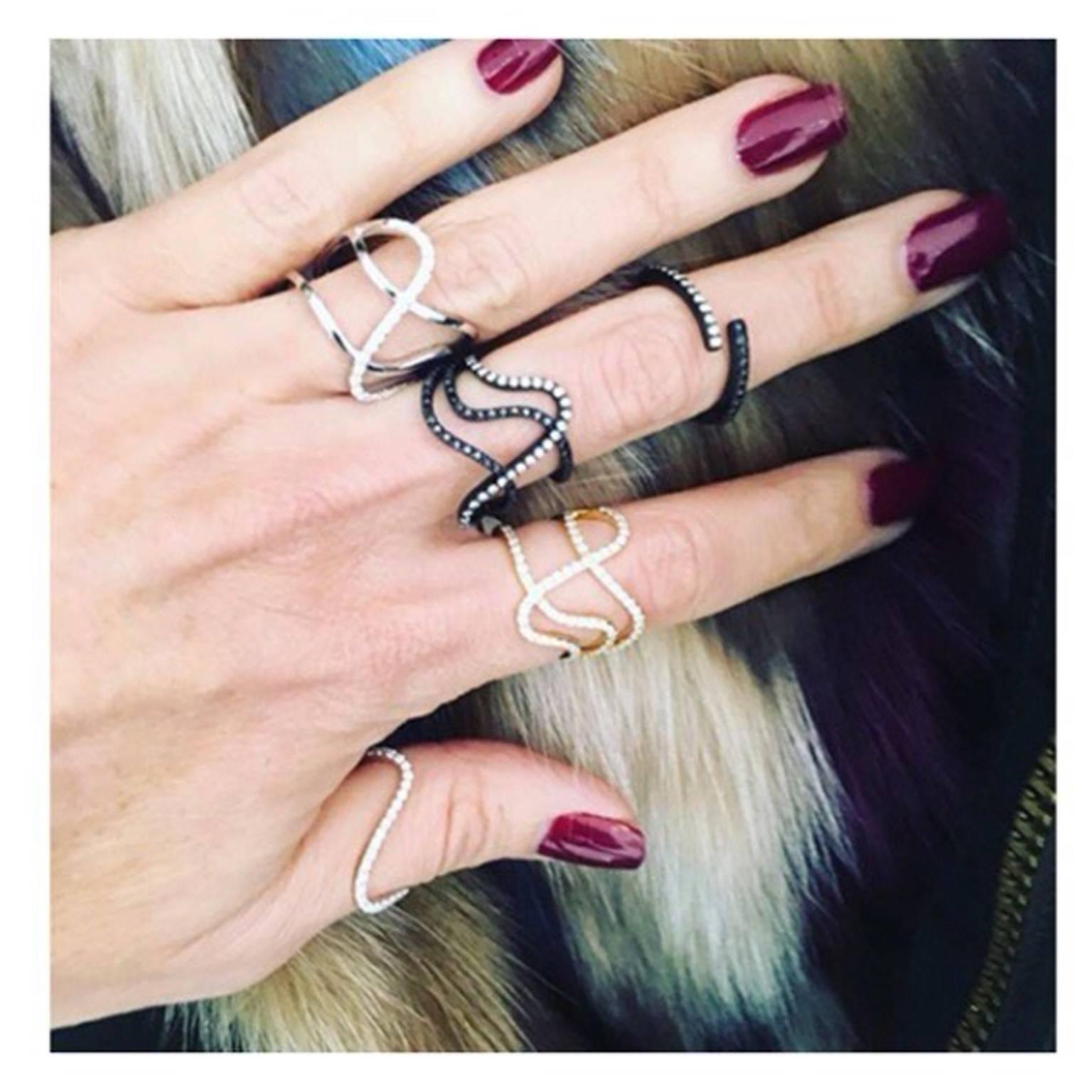 Refined and chic, this is all diamond wavy bar ring makes quite the statement. Wear alone or layer on a couple of our other B+W diamond rings for an edgy look that rivals none!


This ring is ready to ship in a size 6 or 7, for a different size