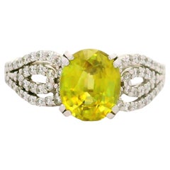 Sphene Diamond Platinum Halo Ring