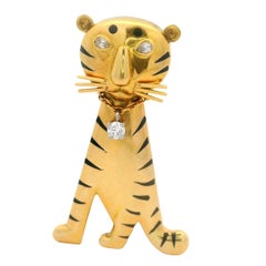Spilla a forma di tigre in oro giallo 18 carati con diamanti