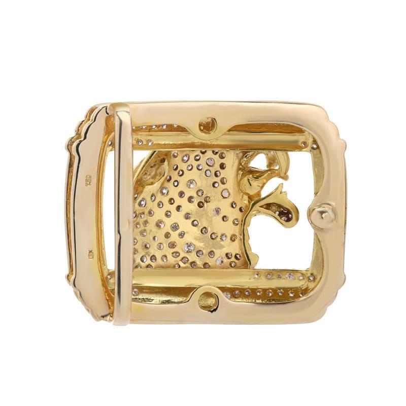This belt buckle is made of solid 18K yellow gold. It features approximately 5.00 carats of round full cut diamonds. A belt buckle that will make a statement. 