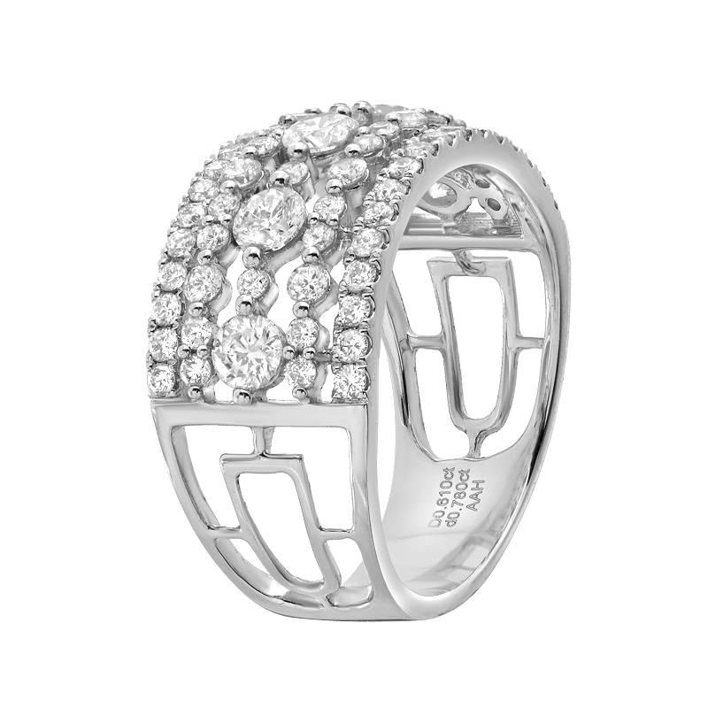 This band features 1.39 carats of VS clarity G-H color round cut diamonds. The two outer rows have diamond pave, while the three inner rows have differentiating sizes of diamonds in a uniform pattern. Made in 18K white gold. 

Size 6 3/4
