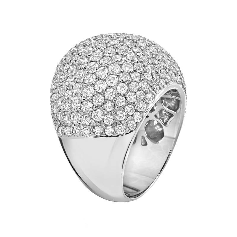 Indulge in this sophisticated domed cocktail ring featuring 7.30 carats of round cut VS quality diamonds. The diamonds are pave set in an 18K white gold setting for the ultimate luxurious touch.

Ring size 6.75