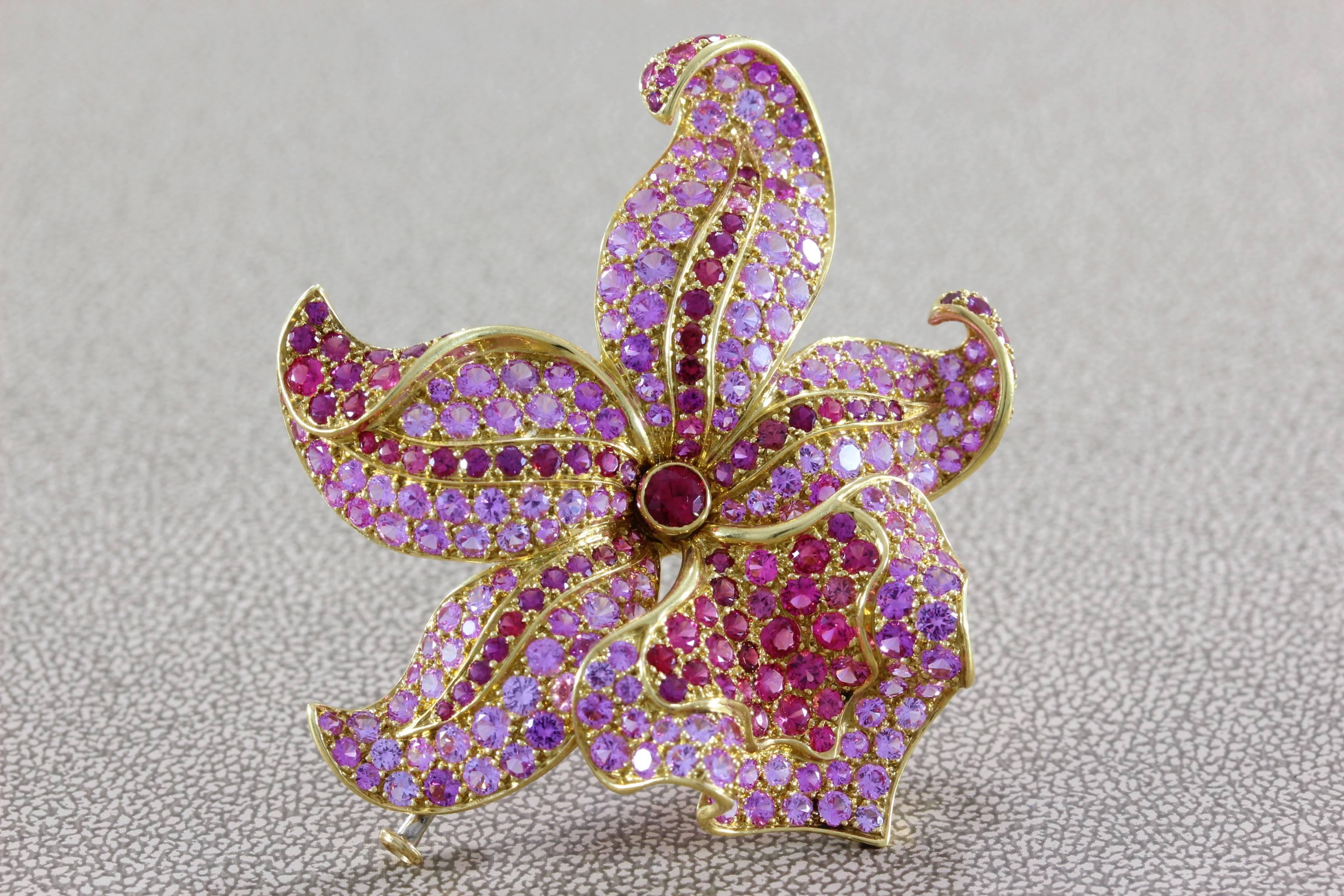 A Tiffany & Co. original, this beautiful French made brooch features over 7 carats of pink sapphire and 3 carats of vivid red spinel which rival the finest of rubies. Set in 18K yellow gold, the quality and workmanship expected from the Tiffany