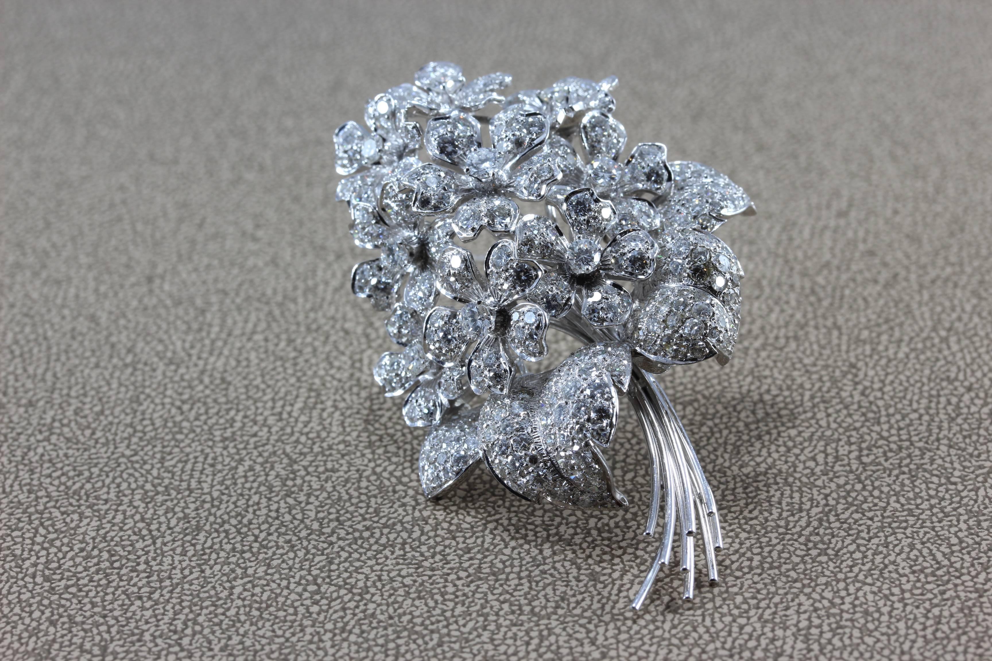 A diamond studded bouquet of flowers, this brooch features over 7 carats of diamonds set in 18K white gold. The pedals dance with light, this is one bouquet worth fighting over!

Dimensions: 2.60 x 1.75 inches
