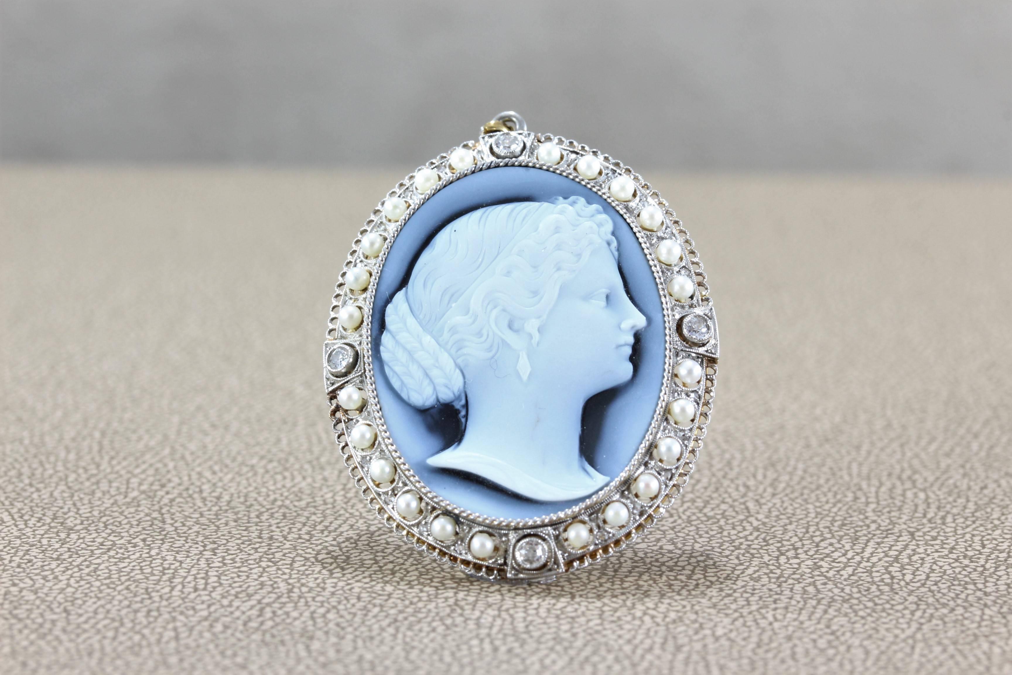 A fine quality hardstone cameo with sharp detail, accented by diamonds and seed pearls set in a 18K gold frame with scroll motifs and milgrain setting. The frame is topped with platinum. 

Can be worn as a brooch or pendant, which do you