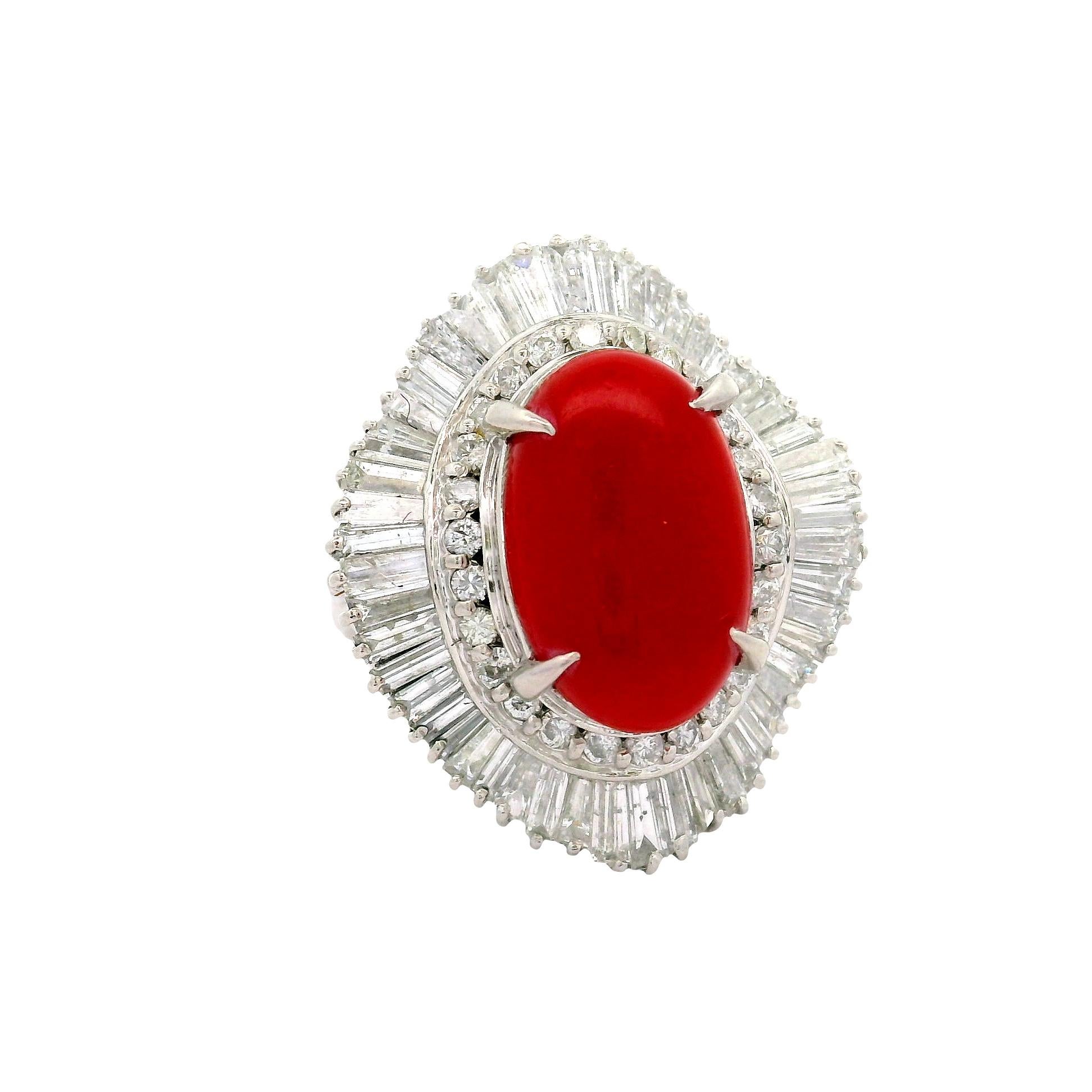 Exquisite craftsmanship. This fashion ring features a captivating coral, radiating vibrant red hues. Encircling the coral is a dazzling array of mixed-cut white diamonds, totaling 2.91 carats, adding brilliance and elegance. Crafted in platinum, the