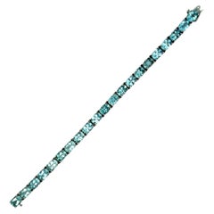 Bracciale tennis con acquamarina in oro bianco 14k