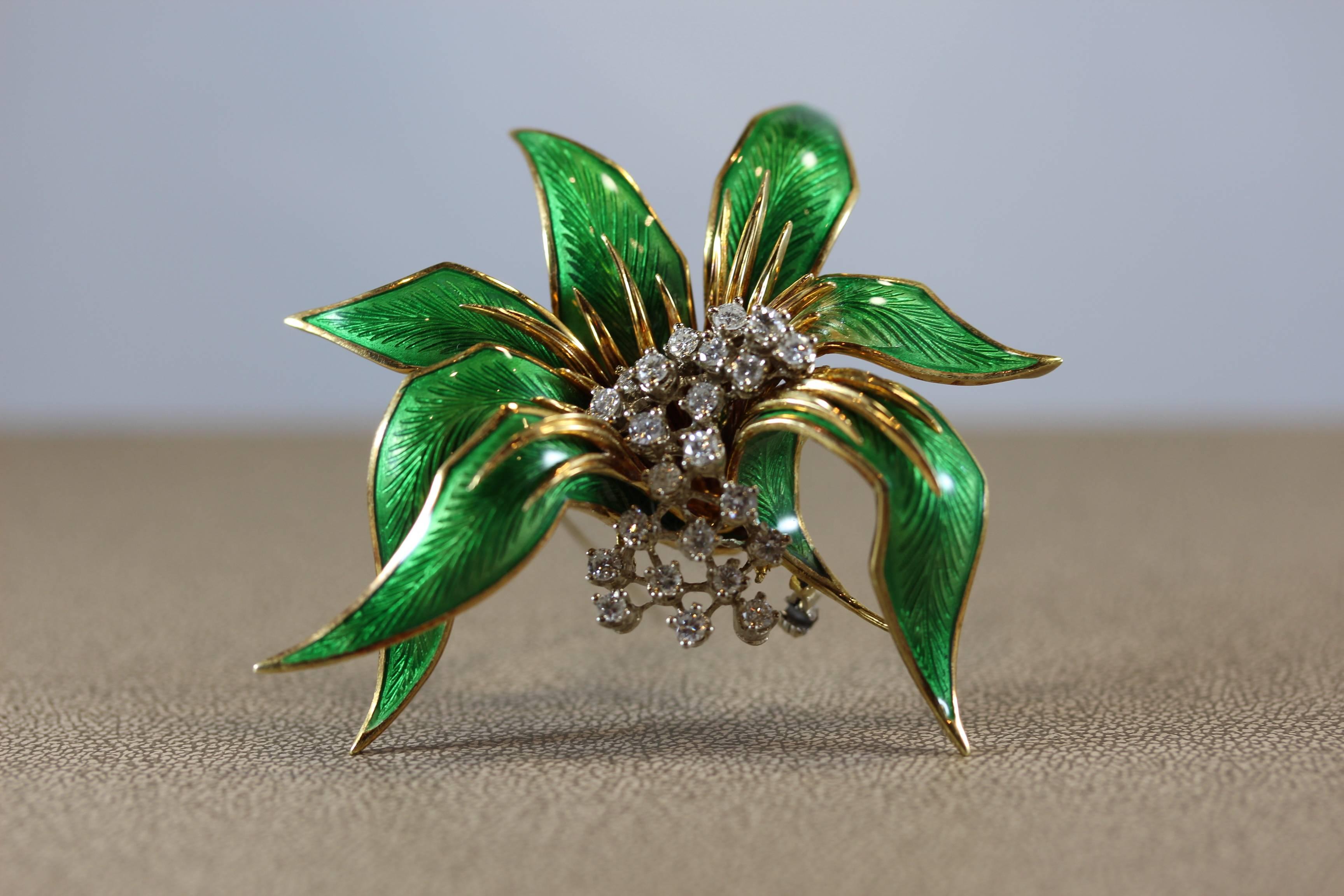 A beautifully made Italian brooch featuring approximately 1.50 carats of full-cut diamonds set in 18k yellow gold. The leaves are covered in green guilloche enamel. 

2.50 x 2.45 inch 