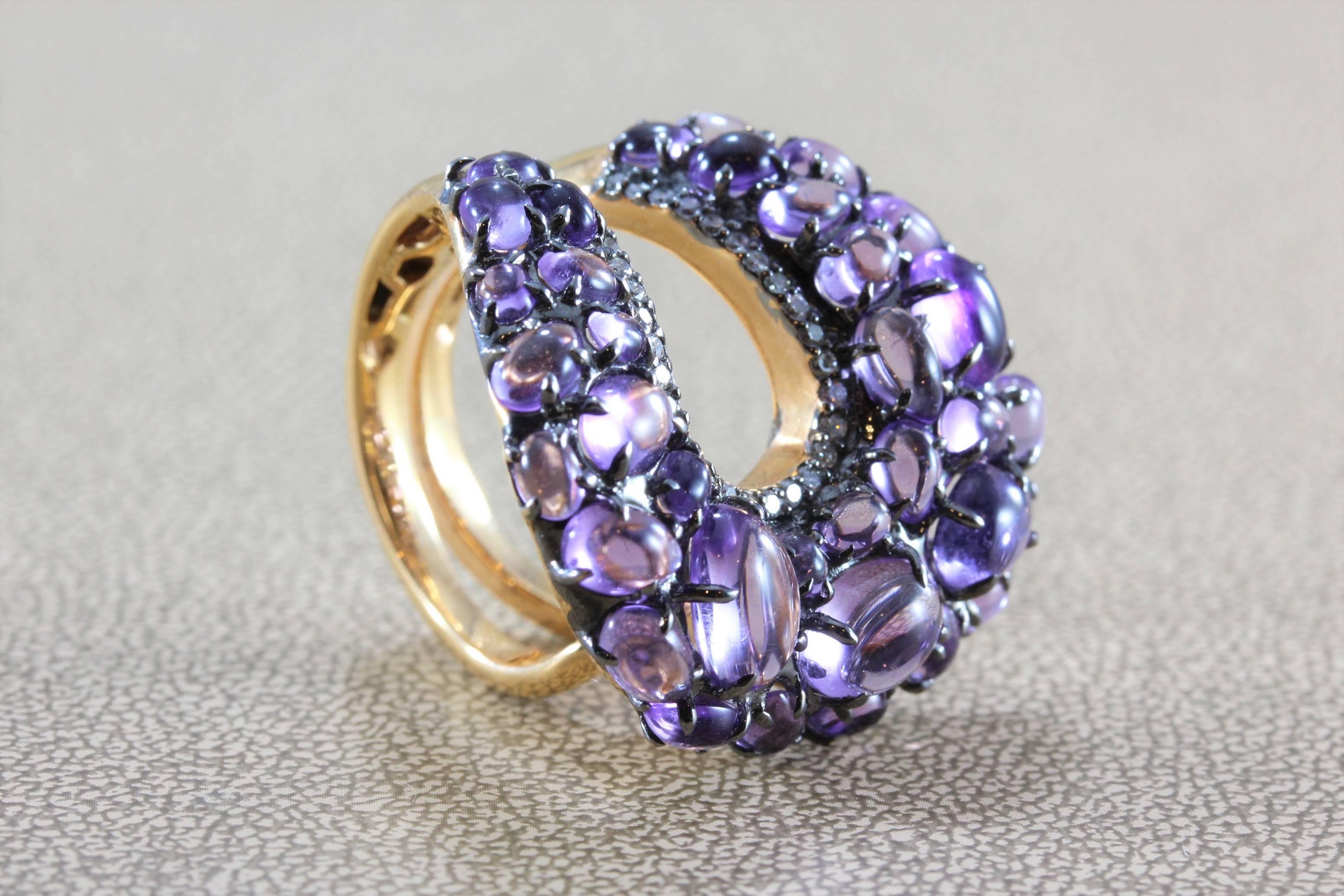 A fun and sexy ring featuring 8.60 carats of cabochon amethyst which are complemented by full-cut diamonds, all set in 18K rose gold.  

Dimensions: 1.10 x 1.00 inches
Ring size 7 (Sizable) 
