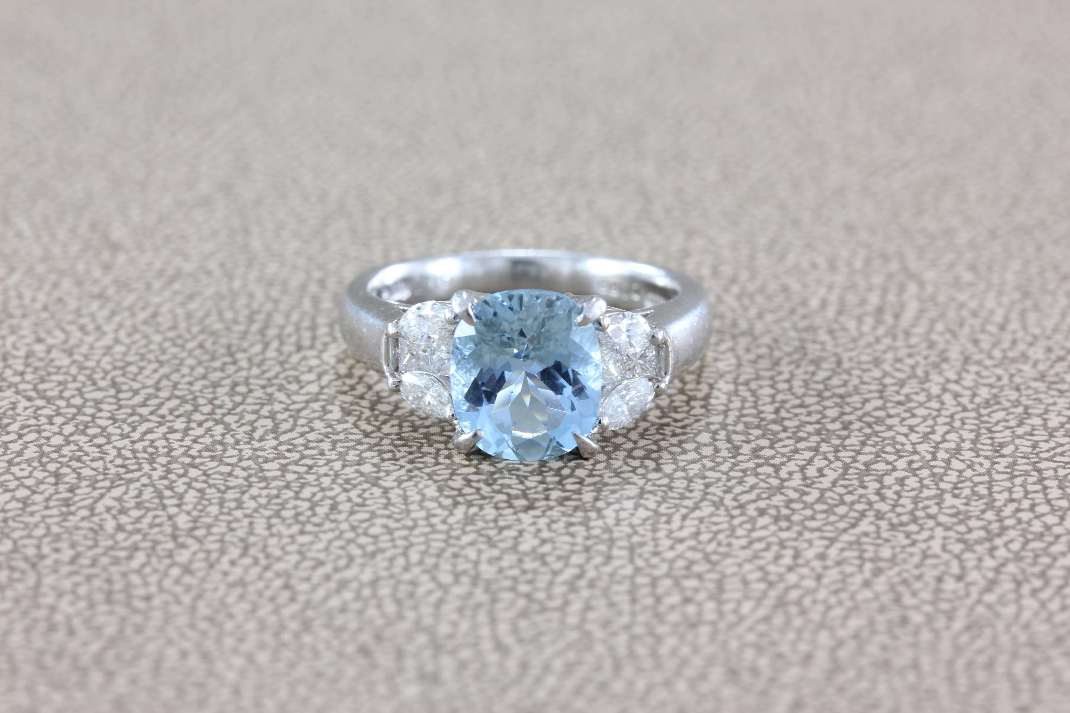 A quality made platinum ring featuring a 2.16 carat gem aquamarine. Accenting the center stone are 0.53 carats of diamond, all set in platinum. A simple everyday ring that will last generations. 

Size 6.25 (sizable) 
