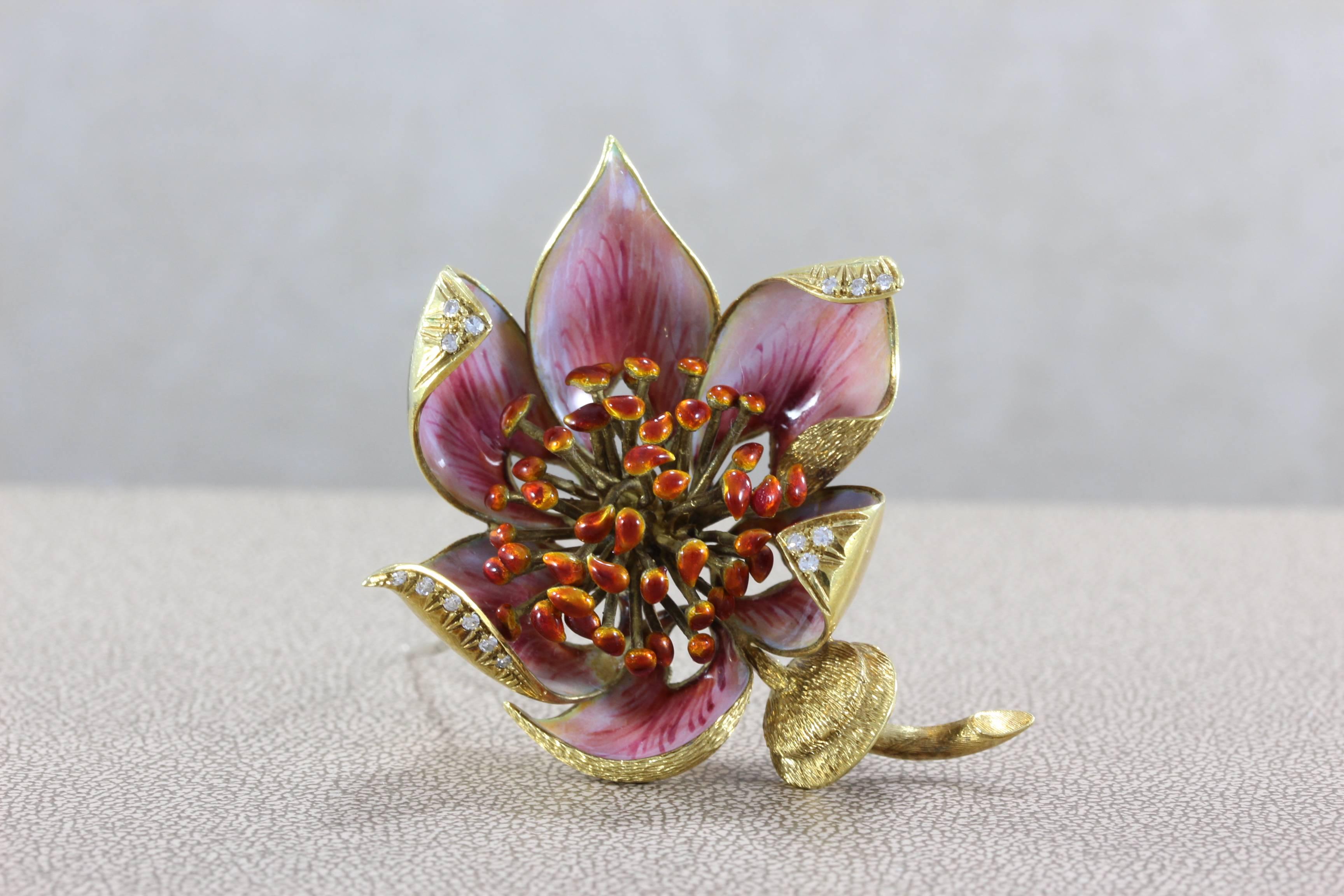 A beautifully made Italian flower brooch with intricate hand painted enamel. Accenting the piece are full-cut diamonds set in 18K yellow gold. Attention to detail is strong in this piece, seen in the enamel painting on the pedals and the gold work