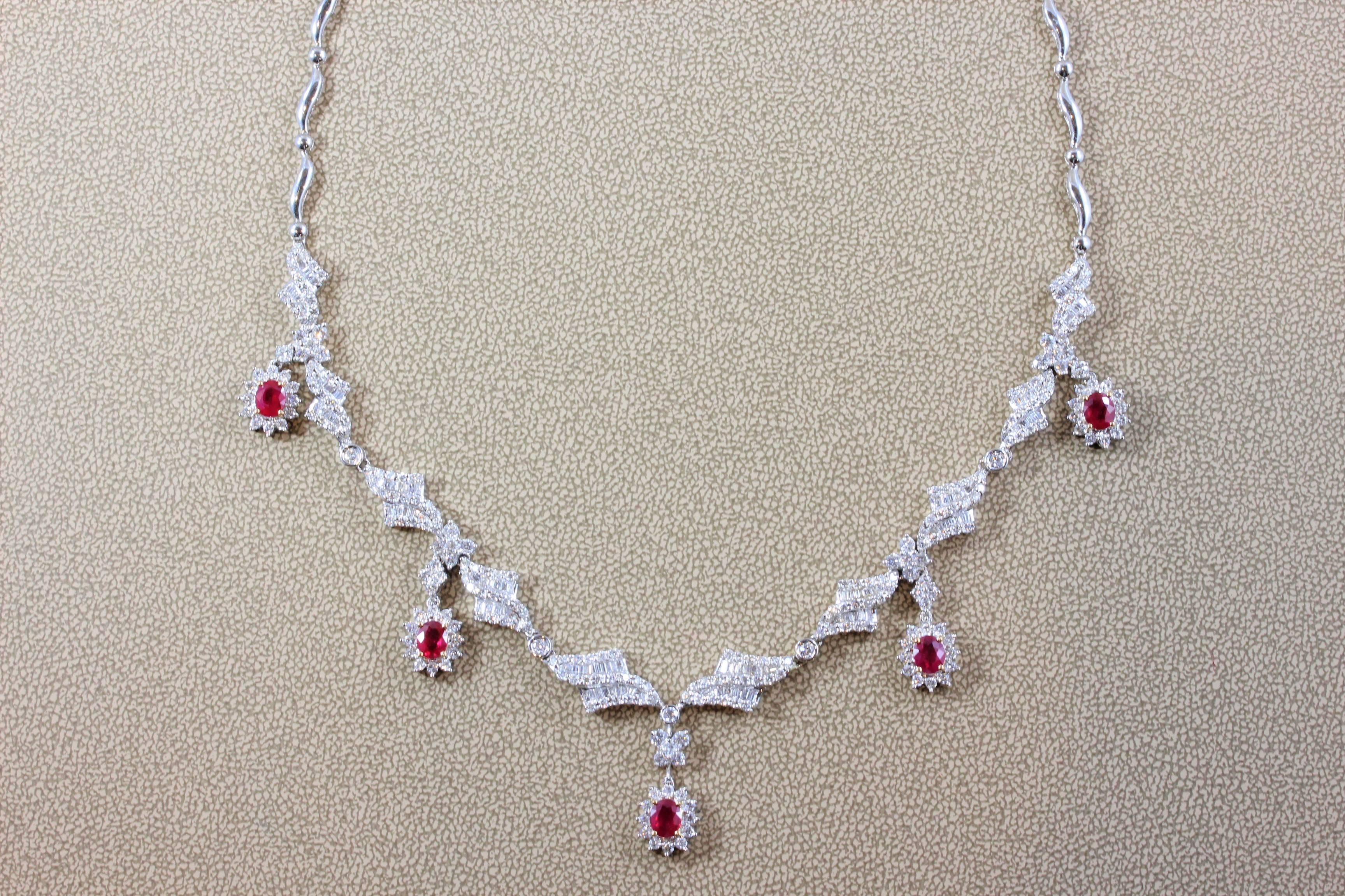 This classic cocktail necklace features 5.12 carats of baguette and round diamonds (VS quality) with 2.50 carats of vivid red rubies.  The diamonds and rubies are set halfway up the necklace and set in 18K white gold. Quality made piece of high