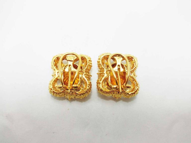 18 Karat Gold Victorian Yellow Sapphire and Diamond Clip-On Earrings

This earrings made in 18k Gold.This earrings made in Victorian style.It looks classic elegant with big shinning Yellow sapphire 7.02 ct and 7.42 ct with the certificate.It is a