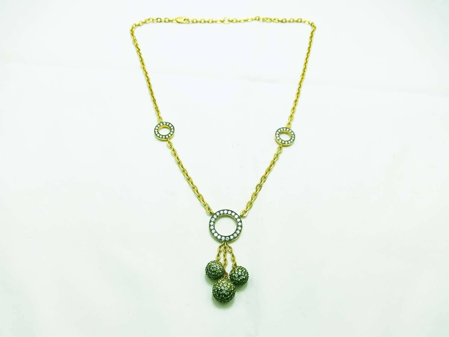 3 Balls Necklace made in 18k Yellow gold .We design as the harmony symbolic.
Green and Yellow Sapphire 4.18 ct
Diamond 0.91 ct H VS quality 
The length is 16.5 inches but you can use as 15 inches,16 inches and 16.5 inches .Because we have a small