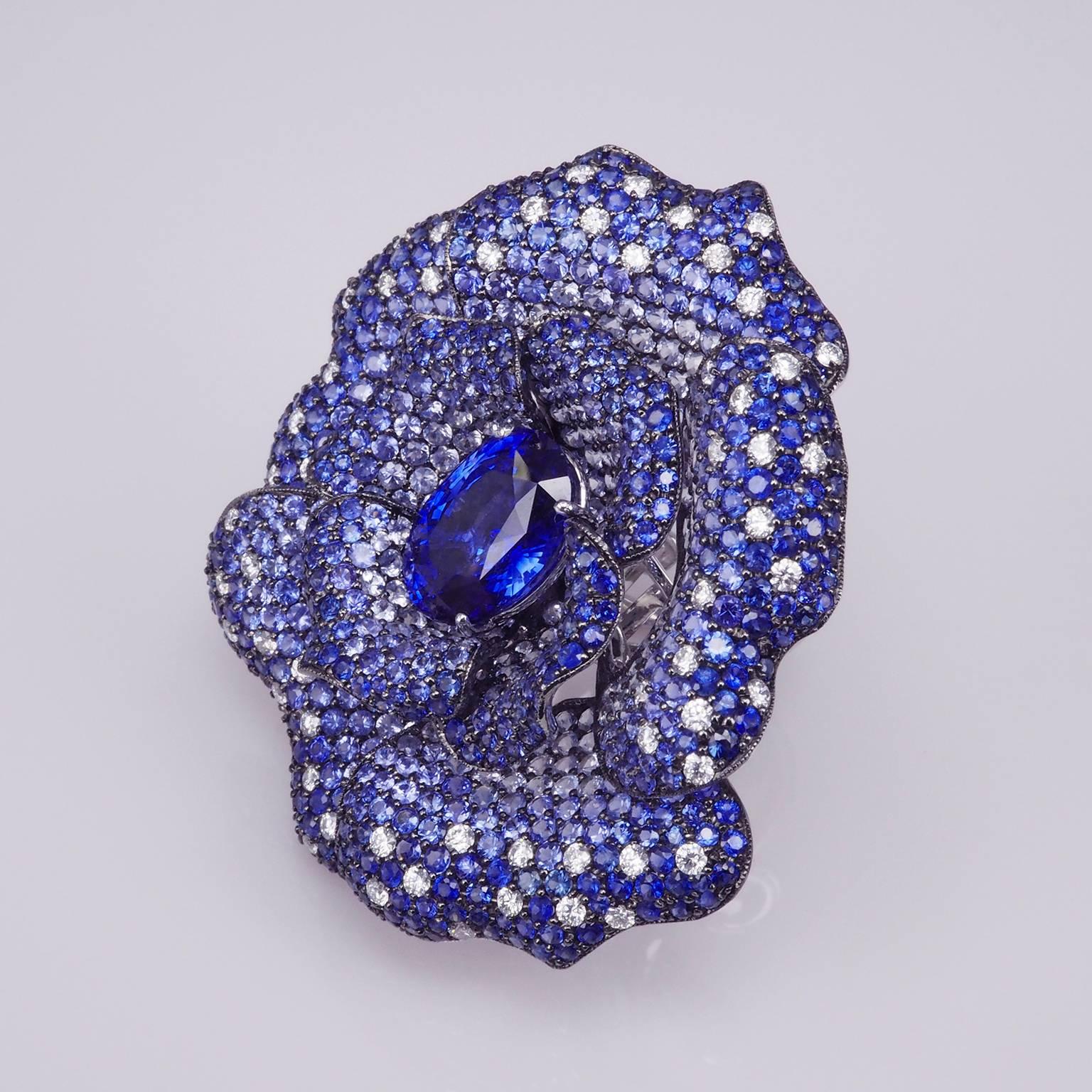 18 Carat White Gold Sapphire Large Rose Cocktail Ring

The master piece Big rose ring made in 18k gold. Shaded the color with sapphire to make it look natural and sweet. We especially design to make the diamond scatter on the rose like a water drop