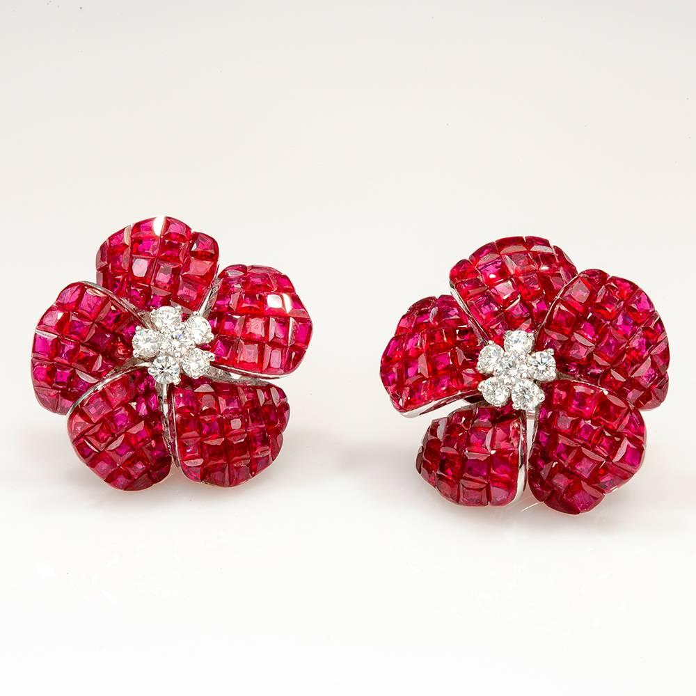 Ruby Invisible flower earrings which make in invisible setting is the top quality ruby.We set the stone in perfection as we are professional in this kind of setting more than 40 years.The invisible is a highly technique .We cut and groove every