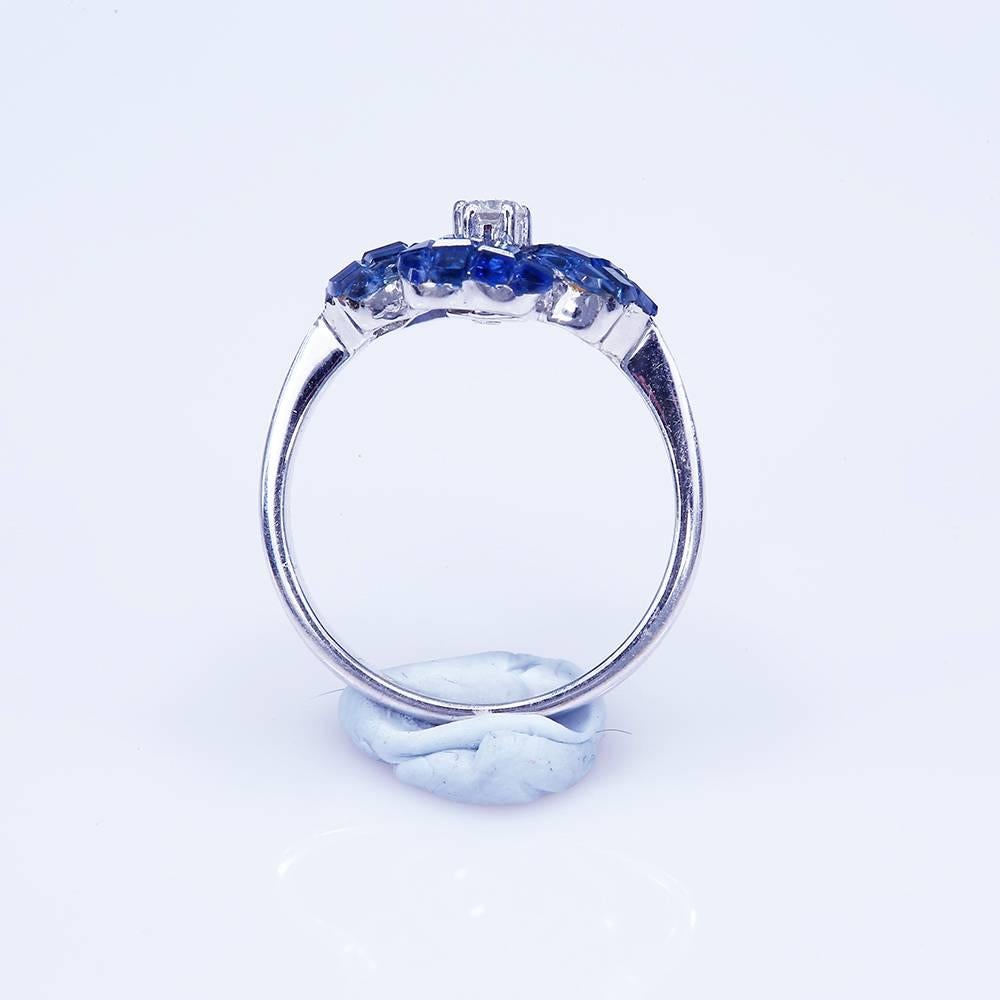 The top quality sapphire which make in invisible setting.We set the stone in perfection as we are professional in this kind of setting more than 40 years.The invisible is a highly technique .We cut and groove every stone .Therefore; we can guarantee