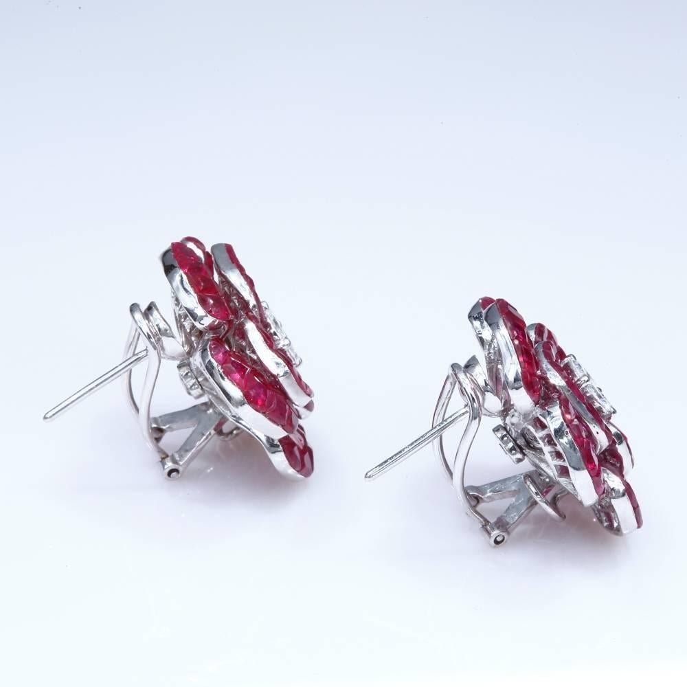 Ruby invisible Rose Earrings use the top quality Ruby which make in invisible setting.We set the stone in perfection as we are professional in this kind of setting more than 40 years.The invisible is a highly technique .We cut and groove every stone