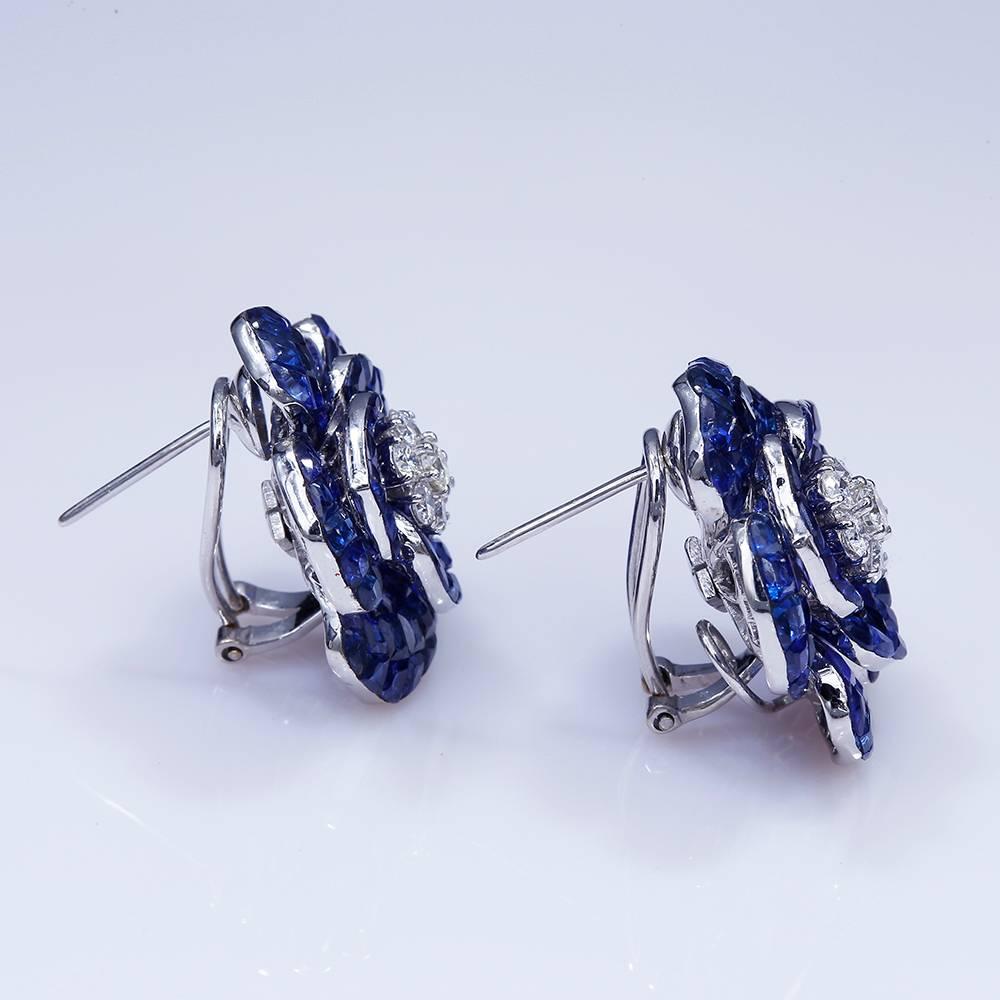 Sapphire invisible Rose Earrings uses the top quality Sapphire which make in invisible setting.We set the stone in perfection as we are professional in this kind of setting more than 40 years.The invisible is a highly technique .We cut and groove