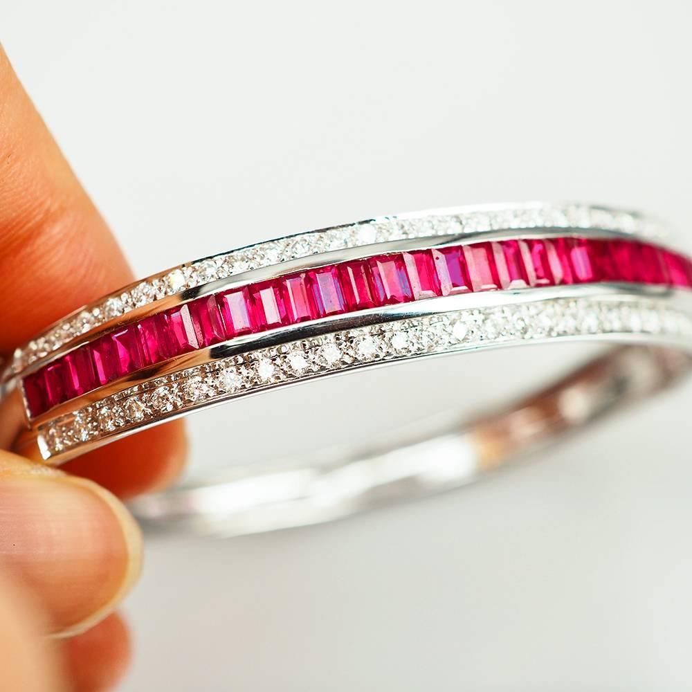  Ruby Bangle use the top quality Ruby which make in invisible setting.We set the stone in perfection as we are professional in this kind of setting more than 40 years.The invisible is a highly technique .We cut and groove every stone .Therefore; we